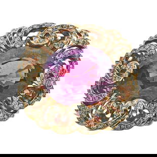 18K Rose Gold 12 carat Rhodolite and Diamond Cocktail Ring: METAL: 18K Rose Gold; APPROXIMATE TOTAL DIAMOND WEIGHT: 1.46 ctw; GEMSTONES: Rhodolite Garnet weighing approx. 12.00 carats; STAMPED: G18K, D1.46, 12ct; CONDITION: Pre-owned, Very Good; ITEM WEIGHT (G