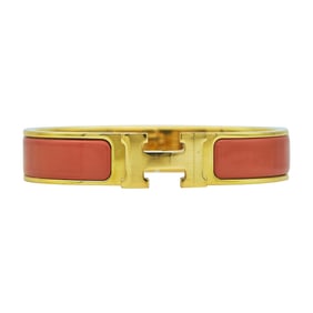 Hermès Clic H Base Metal Orange Enamel Hinged Bangle Bracelet