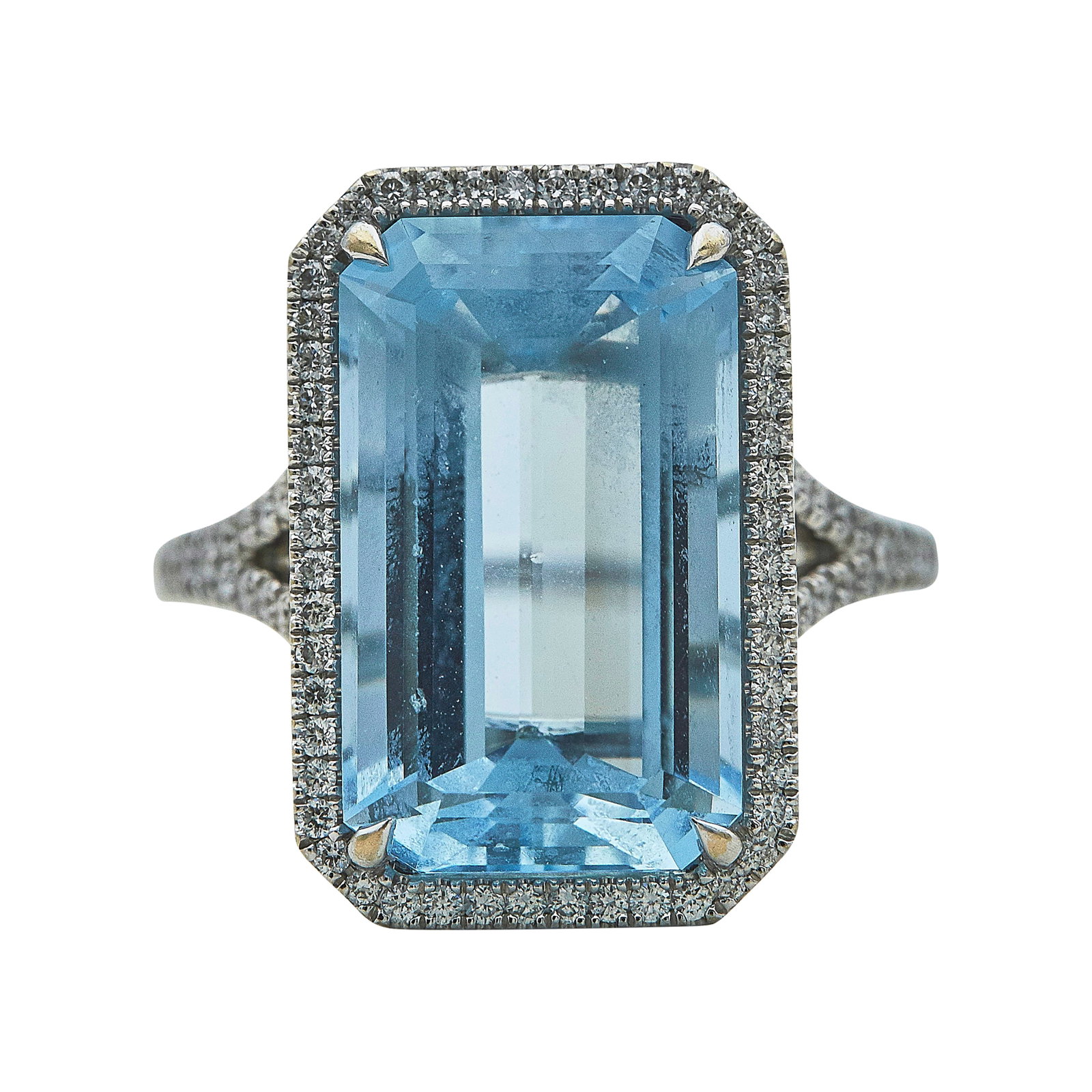 18K White Gold approx. 9.95 carat Aquamarine and Diamond Halo Ring: METAL: 18K White Gold; APPROXIMATE TOTAL DIAMOND WEIGHT: 0.55 ctw; GEMSTONES: Aquamarine weighing approx. 9.95 carats; STAMPED: 750; CONDITION: Pre-owned, Good; ITEM WEIGHT (GRAMS): 7.7 g; MEASUREMENT