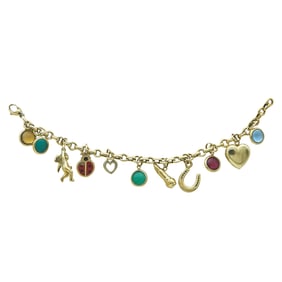 Tiffany & Co. 18K Yellow Gold Bracelet Suspending a Variety of Signed and Unsigned Charms