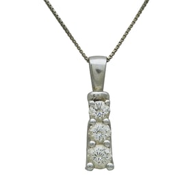 Platinum and Three Stone Diamond Pendant with a 10K White Gold Chain