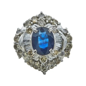 Platinum, Oval Cut Sapphire, and Mixed Cut Diamond Halo Ring