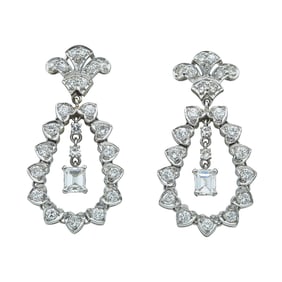 Platinum and Diamond Round Brilliant and Emerald Cut Pear Shaped Pendant Earrings