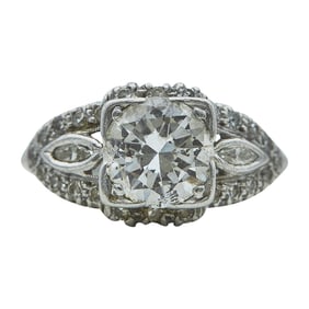 Platinum and Diamond Engagement Ring with Marquise Cut Diamond Set Shoulders