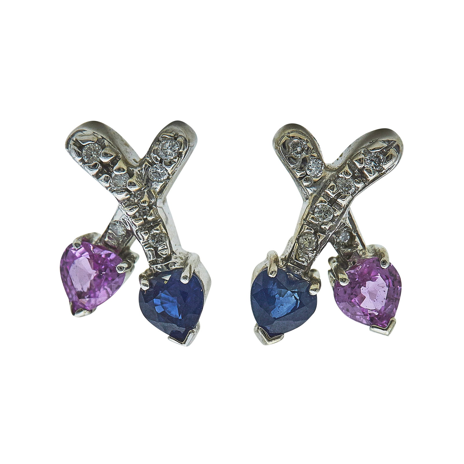 14K White Gold Sapphire, Pink Sapphire, and Diamond Crossed Hearts Earrings: METAL: 14K White Gold; APPROXIMATE TOTAL DIAMOND WEIGHT: 0.12 ctw; GEMSTONES: Sapphire, Pink Sapphire; STAMPED: Backs marked 14K; TESTED: 14K White Gold; CONDITION: Pre-owned, Very Good; ITEM WEIGHT (