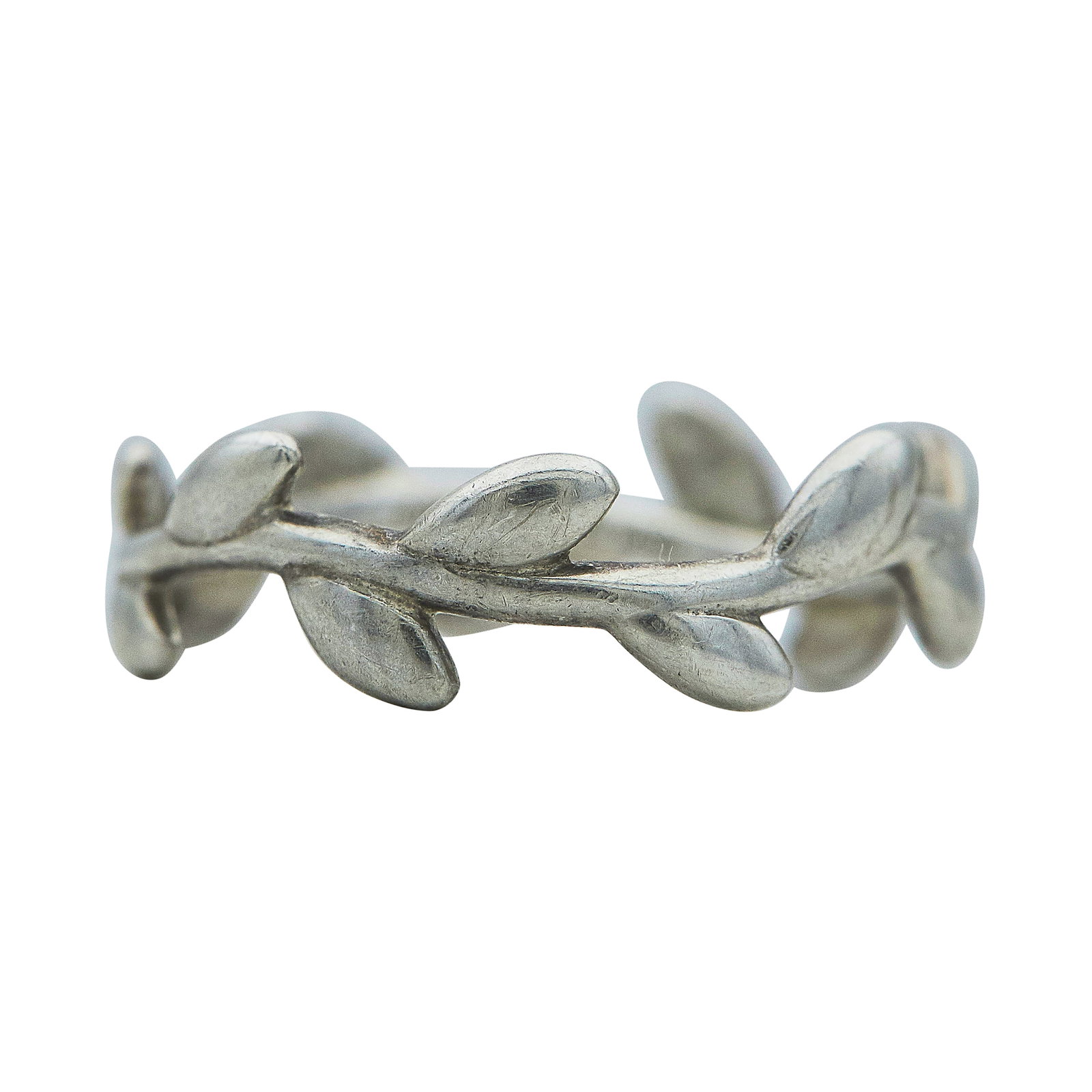 Paloma Picasso for Tiffany & Co. Olive Leaf Sterling Silver Band Ring: BRAND: Paloma Picasso for Tiffany & Co.; COLLECTION: Olive Leaf; METAL: Sterling Silver; STAMPED: © Paloma Picasso, T & Co., AG925; CONDITION: Pre-owned, Good; ITEM WEIGHT (GRAMS): 2 g;