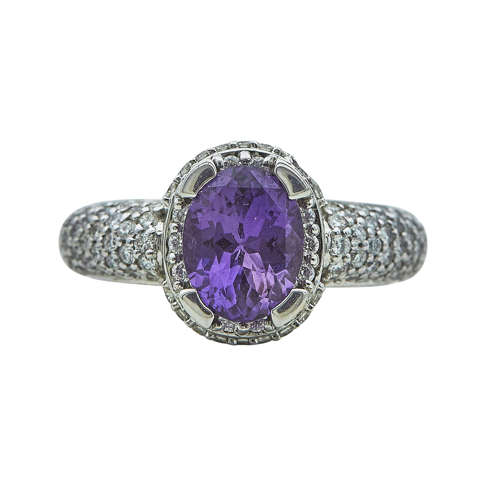 18K White Gold, Purple Sapphire, and Pave Diamond Ring: METAL: 18K White Gold; APPROXIMATE TOTAL DIAMOND WEIGHT: 1.02 ctw; GEMSTONES: Purple sapphire approx. 2.74 carats, Chip on long side of stone on girdle and pavilion; STAMPED: 750; CONDITION: Pre-owned