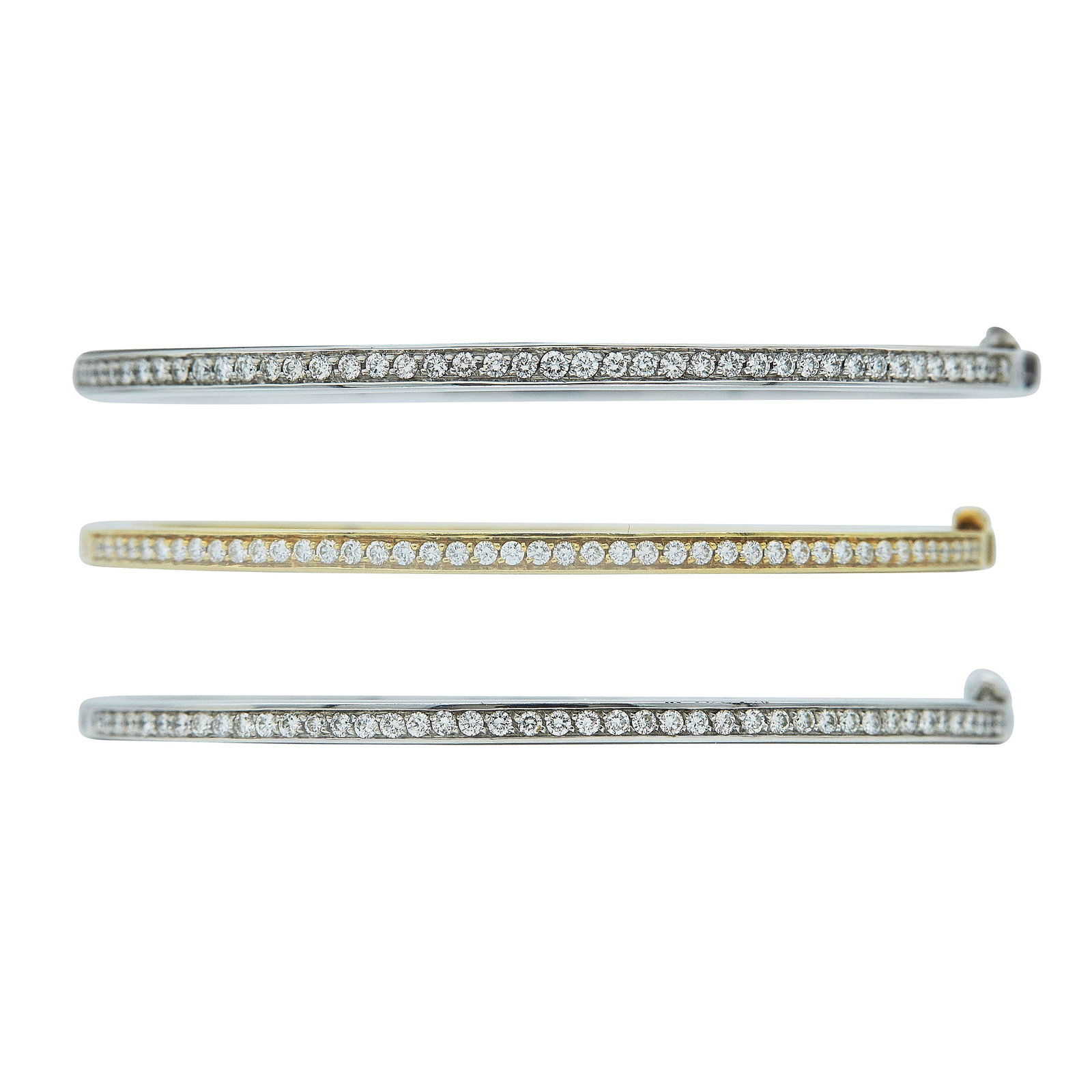 Set of Three 18K White Gold And 18K Yellow Gold Pave Diamond Bangle Bracelets: BRAND: H. Stern; METAL: 18K White Gold/Yellow Gold; APPROXIMATE TOTAL DIAMOND WEIGHT: 2 ctw; STAMPED: all three stamped: 18K, italian makers mark, 750,; CONDITION: Pre-owned, Good; ITEM WEIGHT (GRAMS)