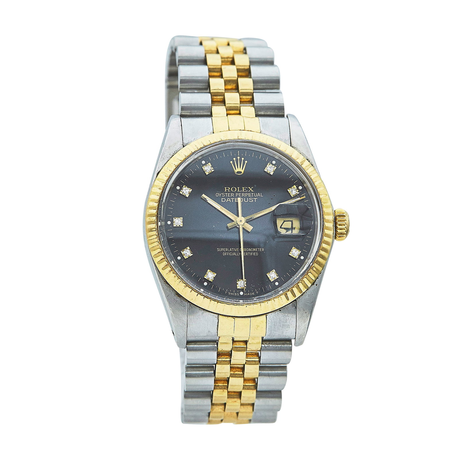 Rolex Datejust 18K/Stainless Steel Watch Ref. 16013, circa 1987: BRAND: Rolex; STYLE: Datejust; REF. #: 16013; CONDITION: Pre-owned, Very Good; YEAR: Circa 1987; ADDITIONAL COMMENTS: 9.4 mil serial, Light scratches throughout crystal, Scratches throughout watch,