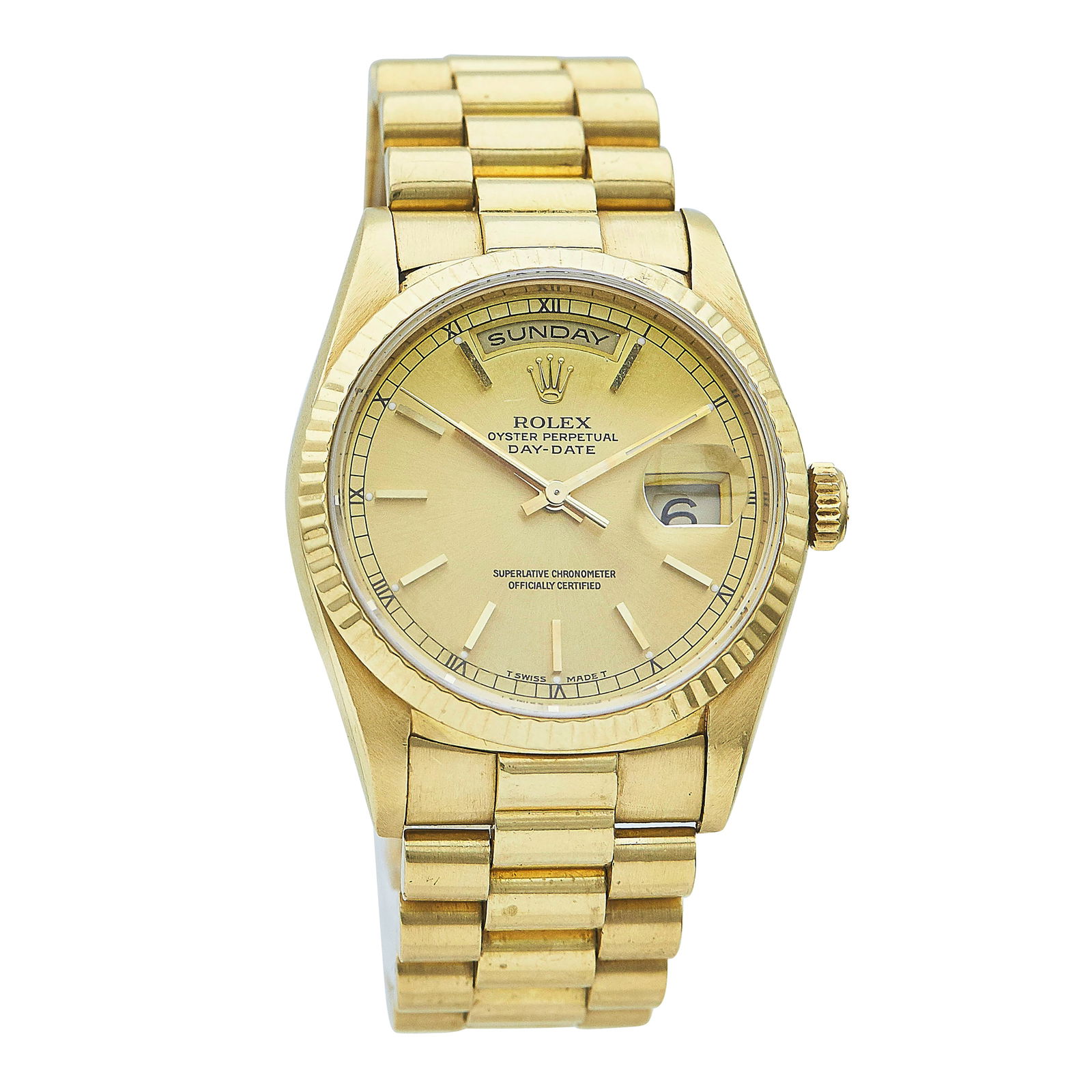 Rolex Day-Date 18K Yellow Gold Watch Ref. 18238, circa 1990: BRAND: Rolex; STYLE: Day-Date; REF. #: 18238; CONDITION: Pre-owned, Very Good; YEAR: Circa 1990; ADDITIONAL COMMENTS: E serial, Light scratches throughout watch, Very small nick on edge of crystal nea