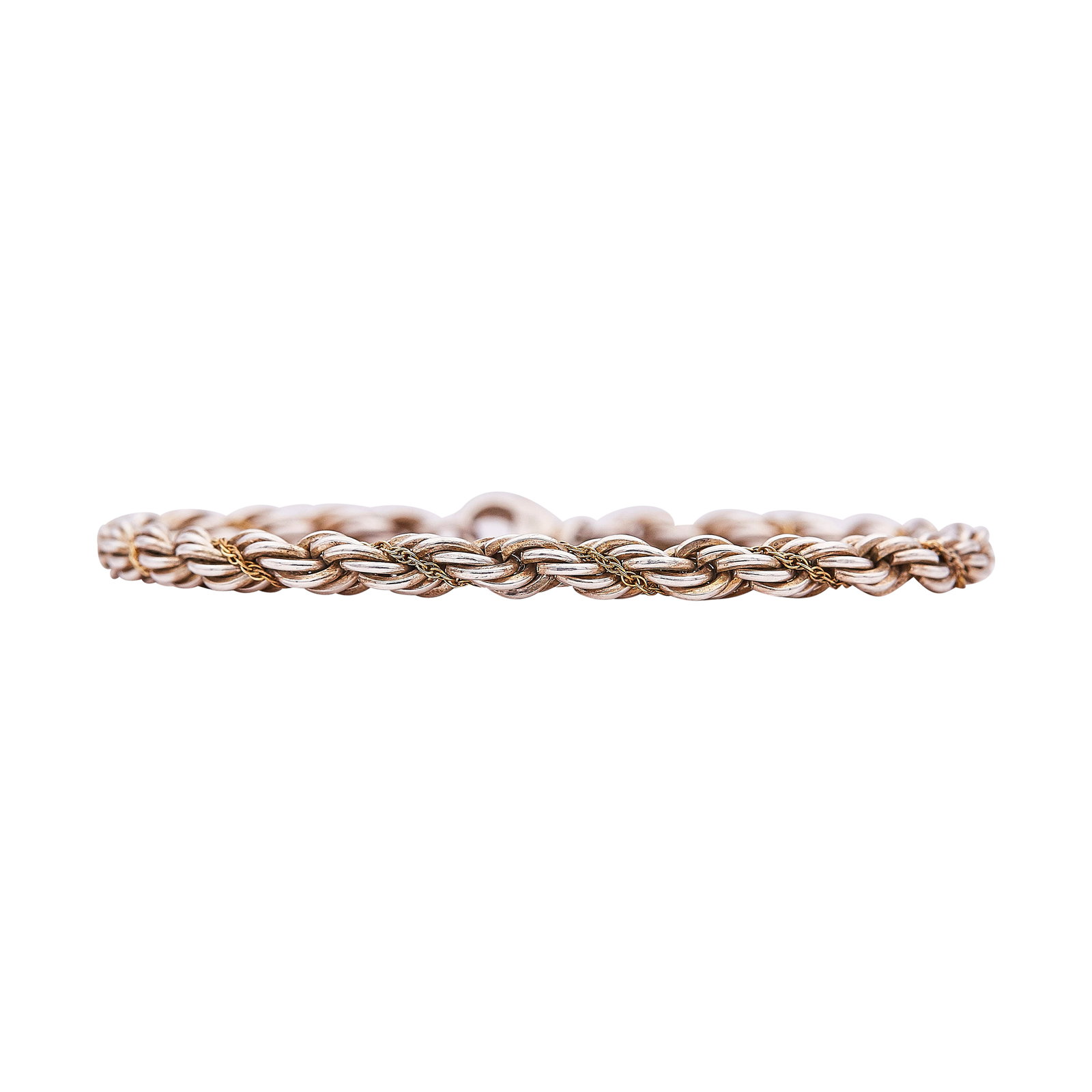 Tiffany & Co. 18K Yellow Gold and Sterling Silver Cable Twist Bracelet: BRAND: Tiffany & Co.; METAL: 18K Yellow Gold/Stainless Steel; STAMPED: Tiffany & Co., 925, 750; CONDITION: Pre-owned, Very Good; ITEM WEIGHT (GRAMS): 13.83 g; MEASUREMENTS: Bracelet 7 inches long