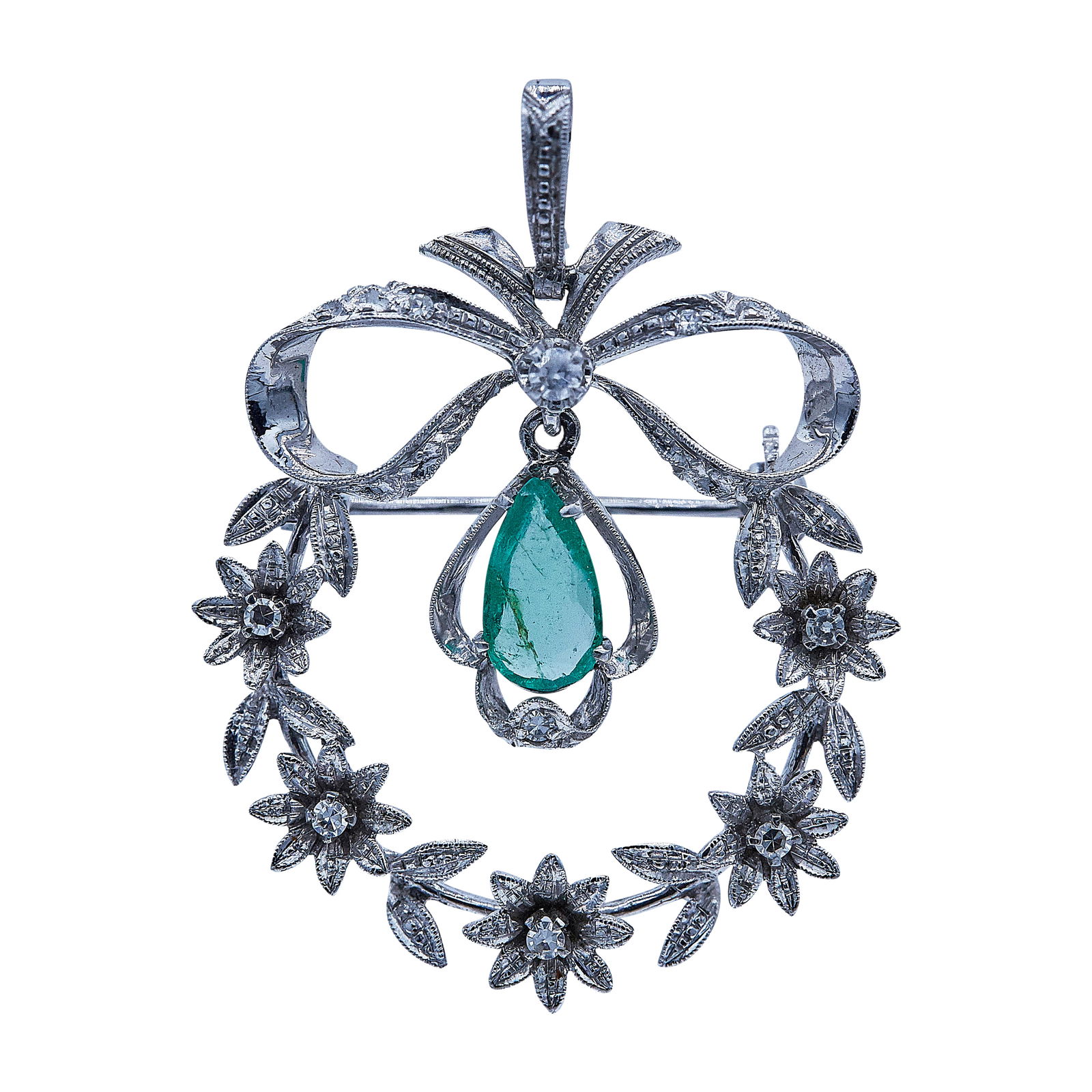 18K White Gold Convertible Brooch And Pendant With Diamonds And Articulated Emerald Drop: METAL: 18K White Gold; APPROXIMATE TOTAL DIAMOND WEIGHT: 0.06 ctw; GEMSTONES: Emerald weighing approx. 0.35 carats; STAMPED: 750; CONDITION: Pre-owned, Good; ITEM WEIGHT (GRAMS): 5.3 g; MEASUREMENTS: