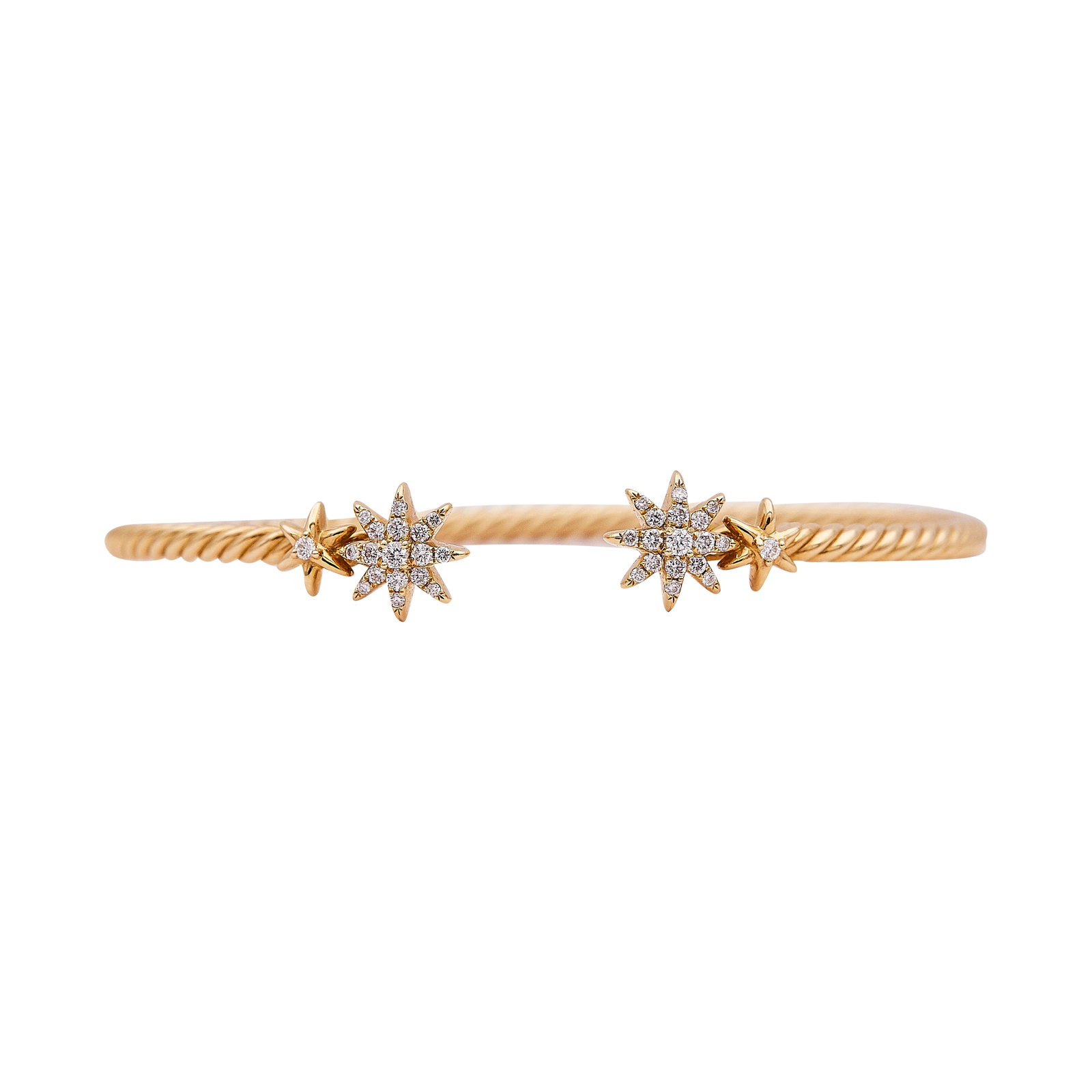 David Yurman 18K Yellow Gold and Diamond Starburst Cable Bracelet: BRAND: David Yurman; METAL: 18K Yellow Gold; APPROXIMATE TOTAL DIAMOND WEIGHT: 0.23 ctw; STAMPED: © D.Y., 750; CONDITION: Pre-owned, Very Good; ITEM WEIGHT (GRAMS): 6.9 g; MEASUREMENTS: Will fit up t