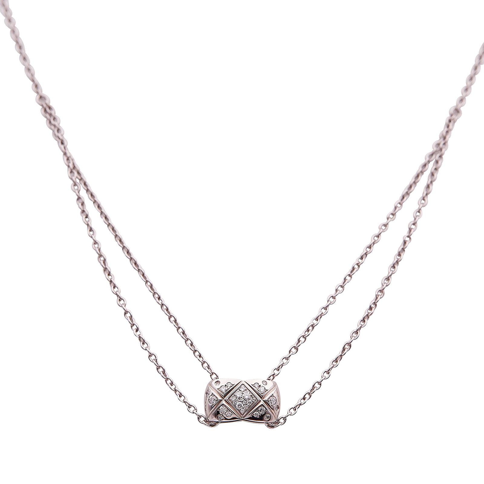 Chanel Coco Crush 18K White Gold and Diamond Pendant Necklace: BRAND: Chanel; COLLECTION: Coco Crush; METAL: 18K White Gold; APPROXIMATE TOTAL DIAMOND WEIGHT: 0.20 ctw; STAMPED: © Chanel, numbered, Au750, Swiss control marks; CONDITION: Pre-owned, Very Good; ITE