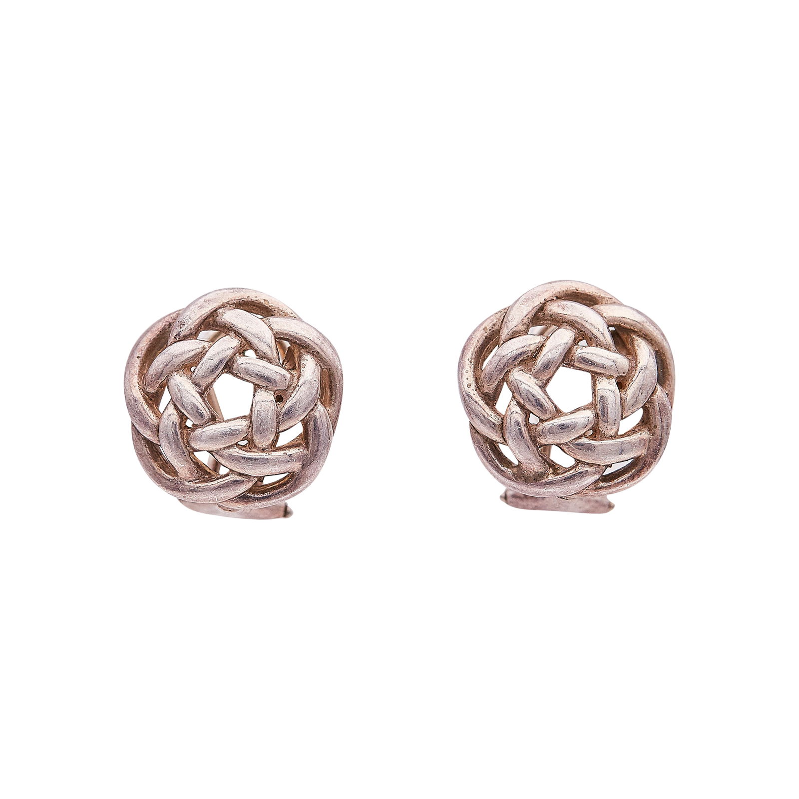 Tiffany & Co. Sterling Silver Knot Earrings: BRAND: Tiffany & Co.; METAL: Sterling Silver; STAMPED: © T & Co., 925, Italy; CONDITION: Pre-owned, Very Good; ITEM WEIGHT (GRAMS): 6.1 g; MEASUREMENTS: Earrings 9/16 in diameter; ADDITIONAL COMMENTS