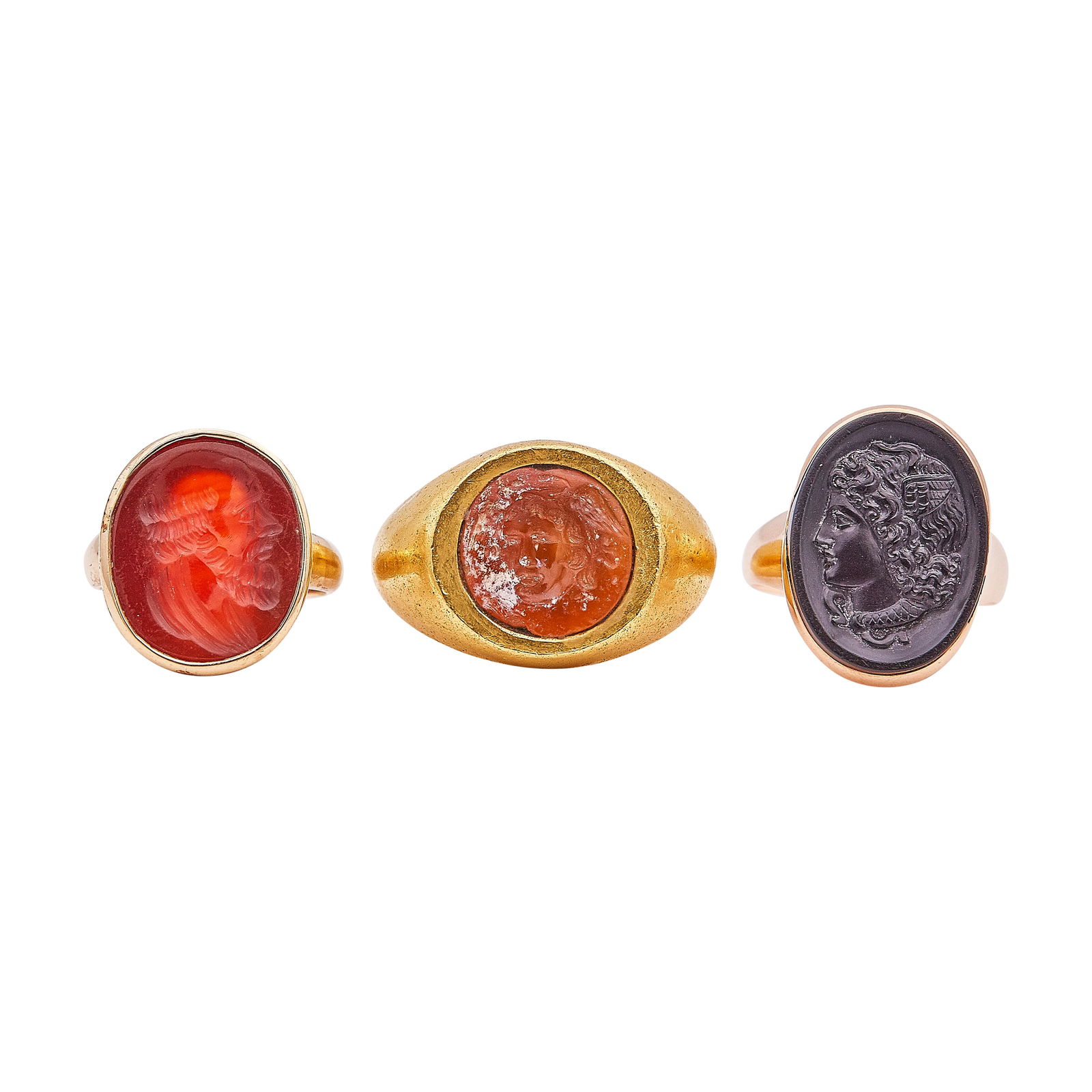 22K, 14K, 10K Yellow Gold Intgalio Ring Lot: METAL: 14K Yellow Gold, 10K Yellow Gold; GEMSTONES: Carnelian and Onyx Intaglios; STAMPED: 14K, 10K; TESTED: 14K Yellow Gold, 10K Yellow Gold; CONDITION: Pre-owned, Good; ITEM WEIGHT (GRAMS): 27.14 g;
