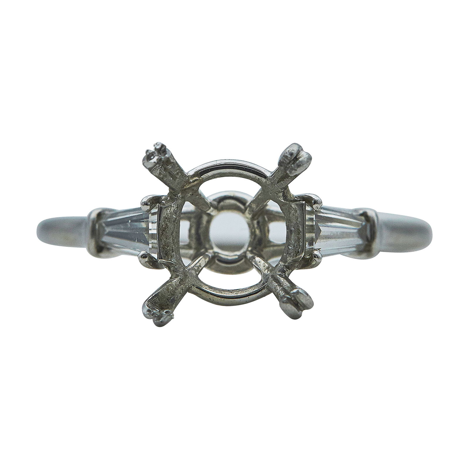 Platinum and Tapered Baguette Cut Diamond Engagement Ring Mount: METAL: Platinum; APPROXIMATE TOTAL DIAMOND WEIGHT: 0.20 ctw; STAMPED: Winston, Platinum, 3.11; CONDITION: Pre-owned; ITEM WEIGHT (GRAMS): 4 g; MEASUREMENTS: Ring size 7 1/2; Center will fit approx. 10