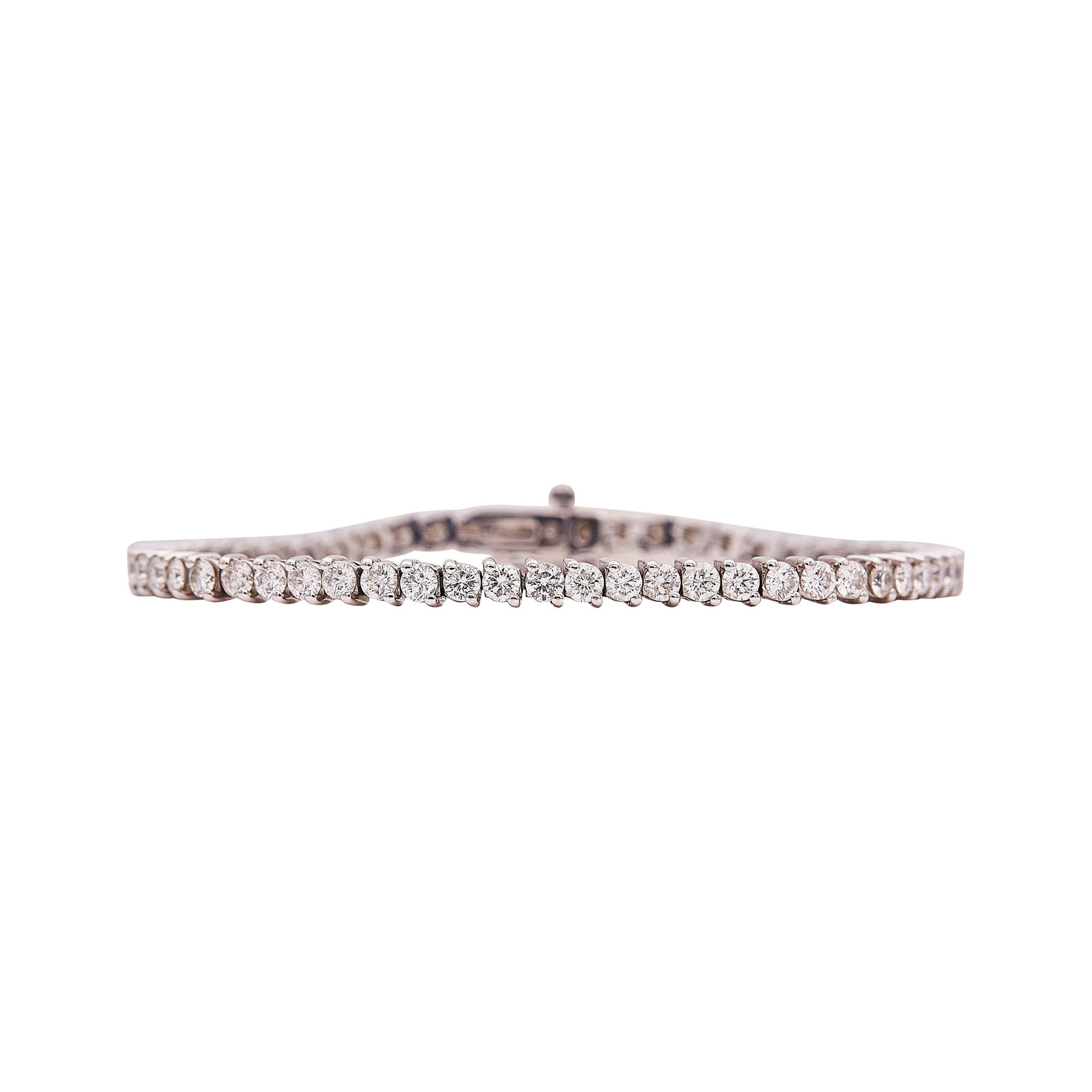 14K White Gold Diamond Approx. 5.80 CTTW Tennis Bracelet: METAL: 14K White Gold; APPROXIMATE TOTAL DIAMOND WEIGHT: 5.80 ctw; STAMPED: 14K; CONDITION: Pre-owned, Very Good; ITEM WEIGHT (GRAMS): 13.43 g; MEASUREMENTS: Bracelet measures approx. 7 inches in leng