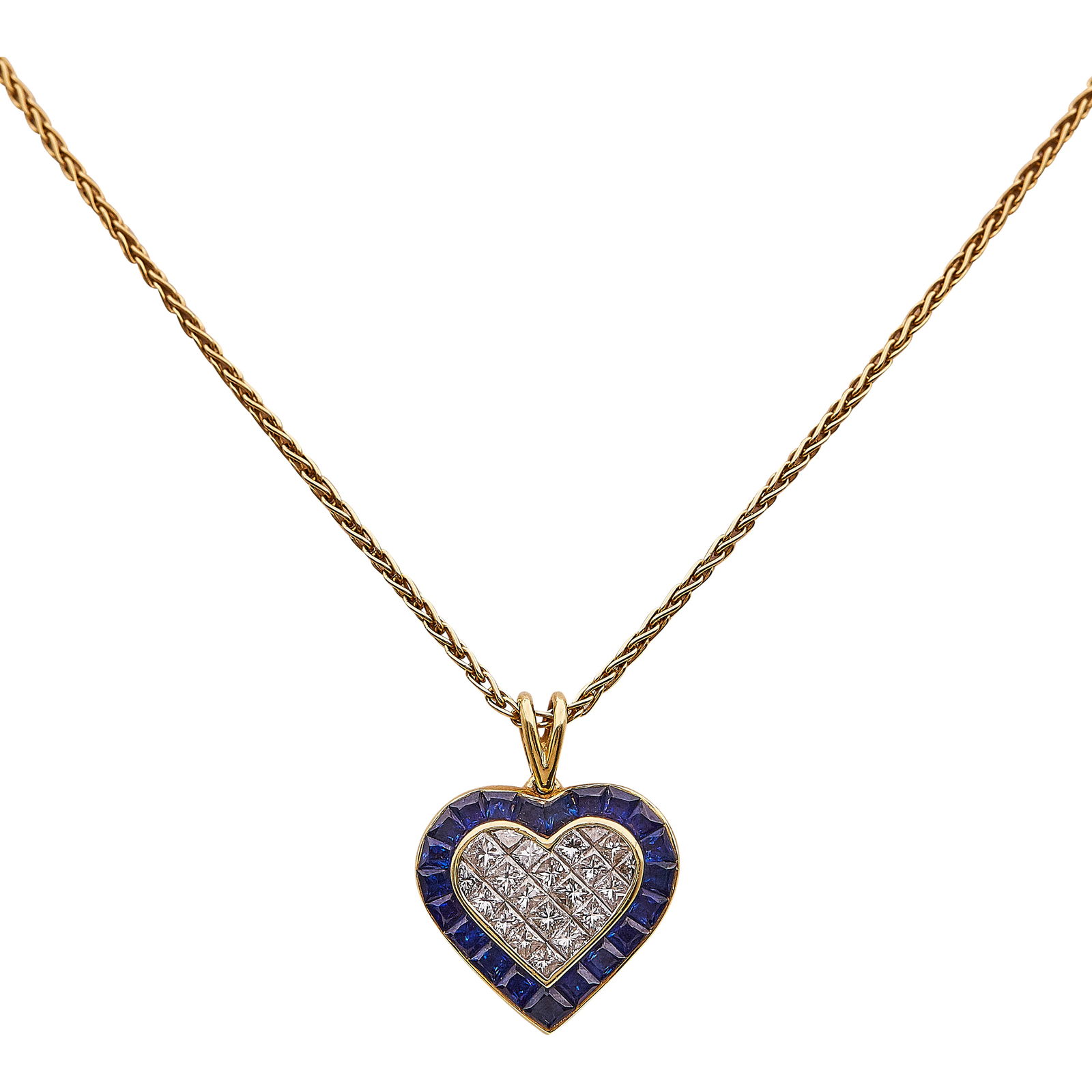 18K Yellow Gold Diamond And Sapphire Halo Heart Pendant Necklace: METAL: 18K Yellow Gold; CARAT WEIGHT: 2.28 ctw; APPROXIMATE TOTAL DIAMOND WEIGHT: 1.19 ctw; GEMSTONES: Blue Sapphires weighing approx. 2.28 CTTW; STAMPED: 1.19 / 2.28, quad, 750, chain stamped 750, ma
