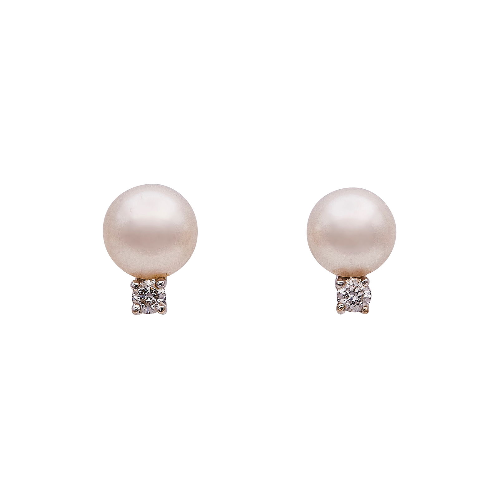 Tiffany & Co. 18K White Gold Cultured Pearl and Diamond Stud Earrings: BRAND: Tiffany & Co.; METAL: 18K White Gold; APPROXIMATE TOTAL DIAMOND WEIGHT: 0.10 ctw; GEMSTONES: Cultured pearls approx. 7mm in diameter; STAMPED: © T & Co., 750; CONDITION: Pre-owned, Very Good;