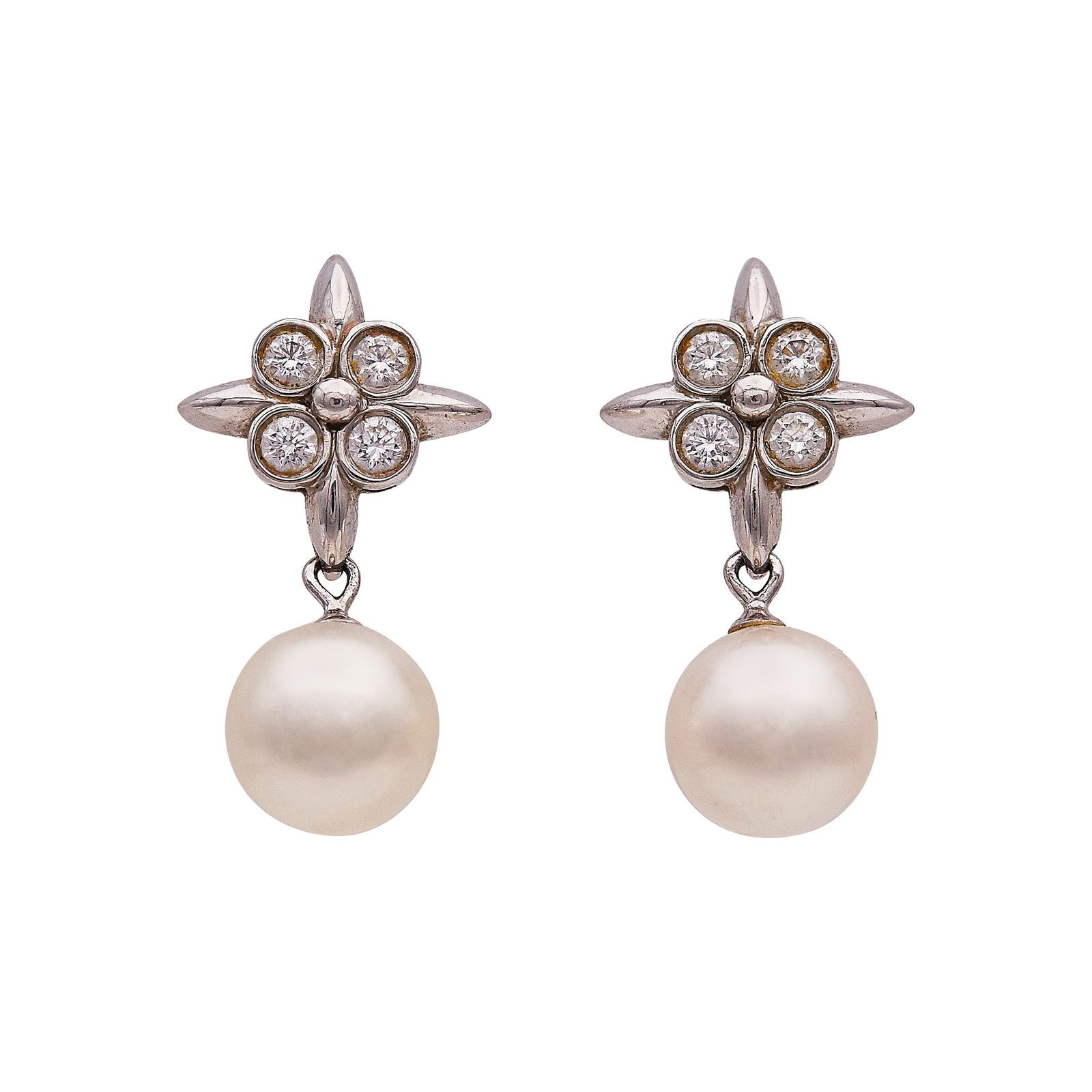 Tiffany & Co. Platinum Pearl, and Diamond Drop Earrings: BRAND: Tiffany & Co.; METAL: Platinum; APPROXIMATE TOTAL DIAMOND WEIGHT: 0.24 ctw; GEMSTONES: Pearls approx. 7mm in diameter; STAMPED: Tiffany & Co., PT950; CONDITION: Pre-owned, Very Good; ITEM WEIGH
