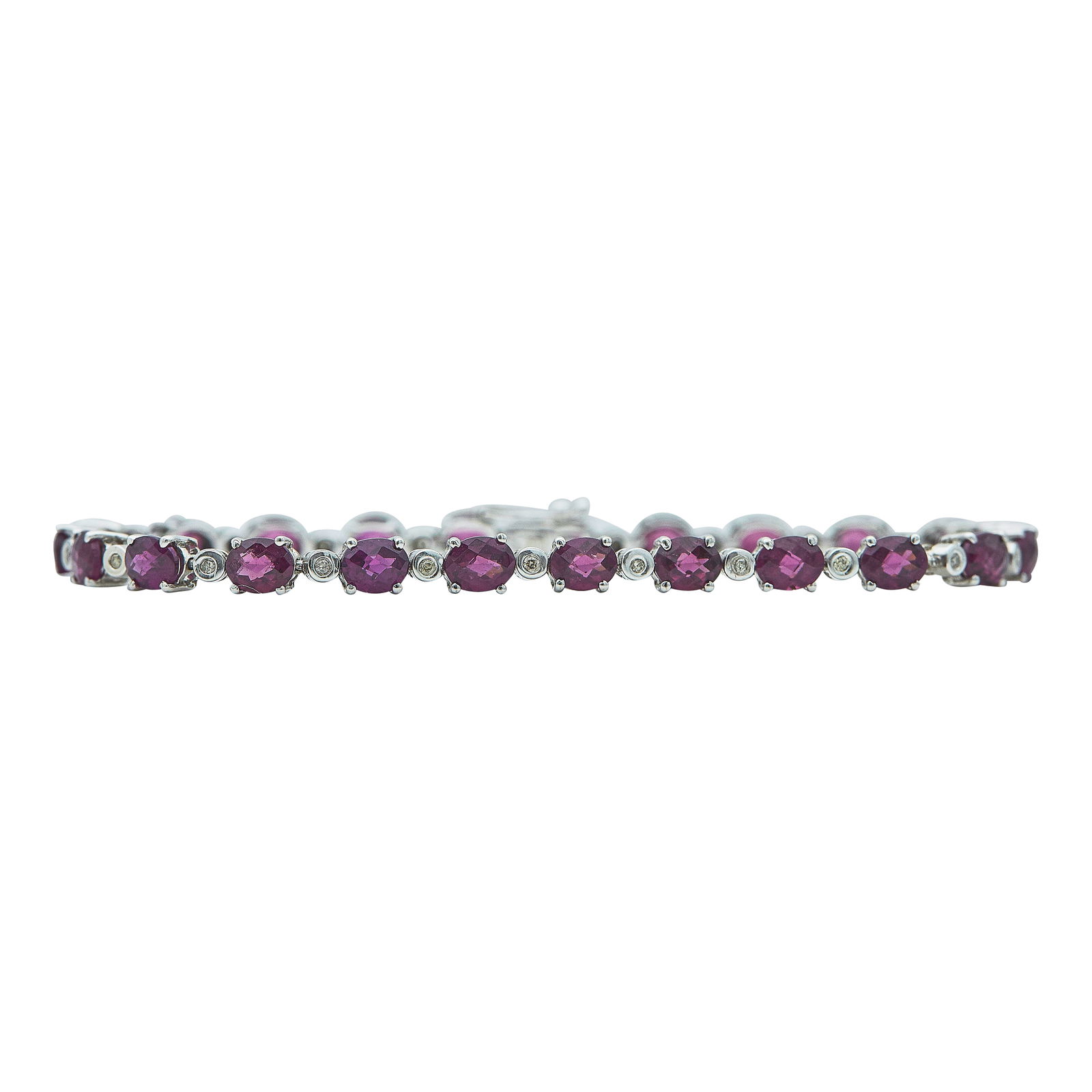 18K Yellow Gold Garnet And Diamond Tennis Bracelet: METAL: 18K Yellow Gold; APPROXIMATE TOTAL DIAMOND WEIGHT: 0.18 ctw; GEMSTONES: Garnets weighing approx. 10.60 cttw; STAMPED: ZEN 750 D0.18, C: 10.60; CONDITION: Pre-owned, Very Good; ITEM WEIGHT (GRAM