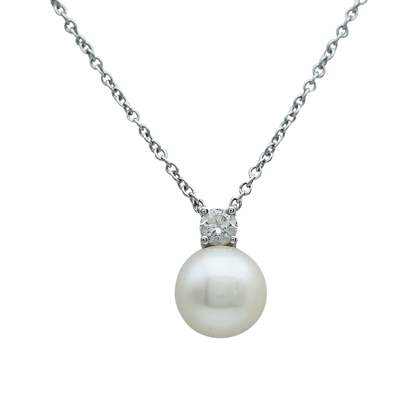 Tiffany & Co. Signature 18K White Gold Pearl And Diamond Necklace: BRAND: Tiffany & Co.; COLLECTION: Signature; METAL: 18K White Gold; APPROXIMATE TOTAL DIAMOND WEIGHT: 0.10 ctw; GEMSTONES: White Akoya cultured pearl measuring approx. 7.50 mm in diameter; STAMPED: T&