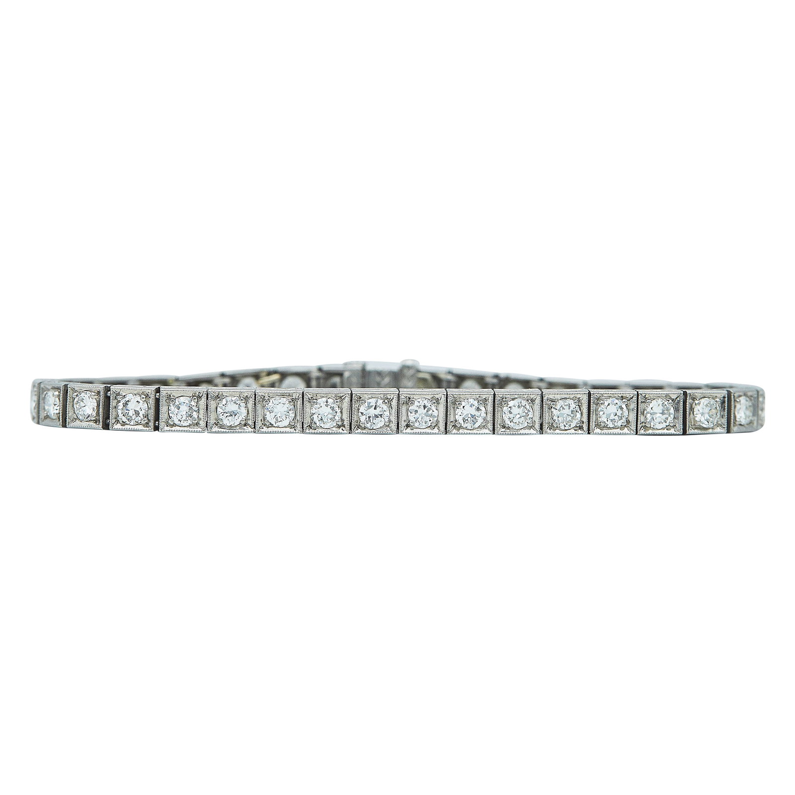 Platinum and Old European Cut Diamond Line Bracelet: METAL: Platinum; APPROXIMATE TOTAL DIAMOND WEIGHT: 3.60 ctw; STAMPED: rubbed marks; CONDITION: Pre-owned, Very Good; ITEM WEIGHT (GRAMS): 18.2 g; MEASUREMENTS: Bracelet 6 3/4 inches long