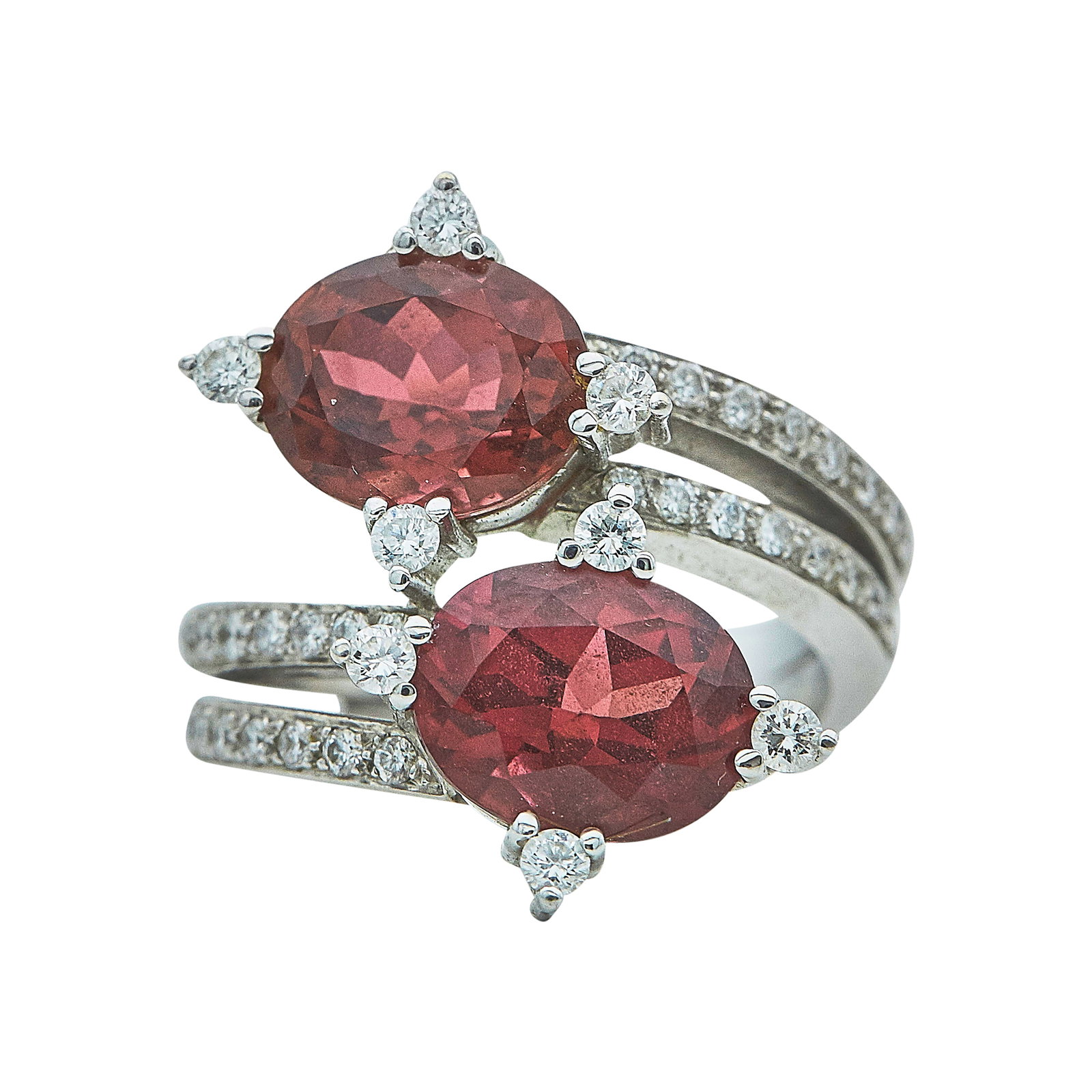 18K White Gold Tourmaline And Diamond Bypass Ring: METAL: 18K White Gold; APPROXIMATE TOTAL DIAMOND WEIGHT: 0.45 ctw; GEMSTONES: Tourmaline weighing approx. 5.00 cttw, with small chips on table; TESTED: 18K White Gold; CONDITION: Pre-owned, Good; ITEM