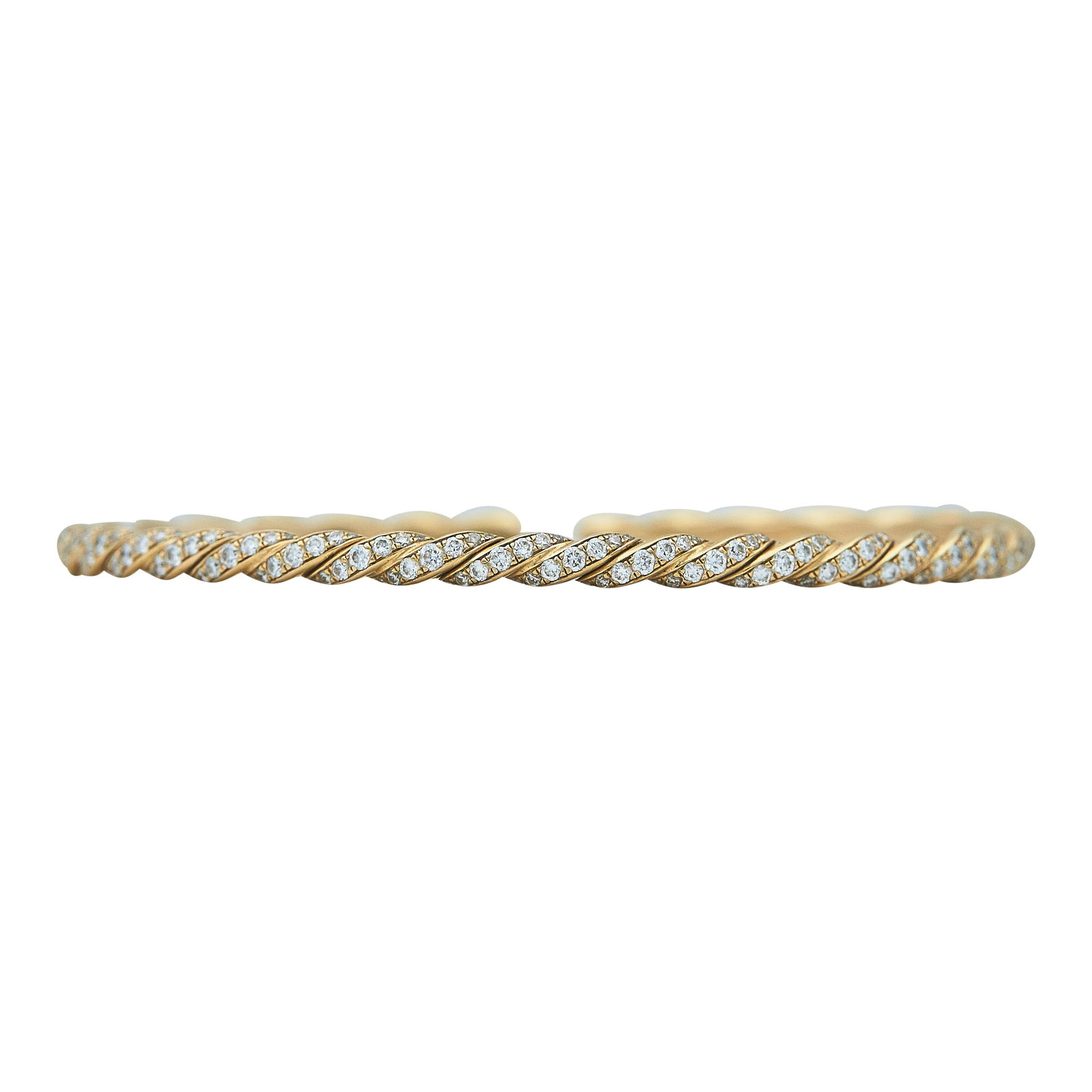 David Yurman Sculpted Cable 18K Rose Gold And Pave Diamond Flexible Cuff Bracelet: BRAND: David Yurman; COLLECTION: Sculpted Cable; METAL: 18K Rose Gold; APPROXIMATE TOTAL DIAMOND WEIGHT: 1.63 ctw; STAMPED: D.Y. 750; CONDITION: Pre-owned, Very Good; ITEM WEIGHT (GRAMS): 11.5 g; MEAS