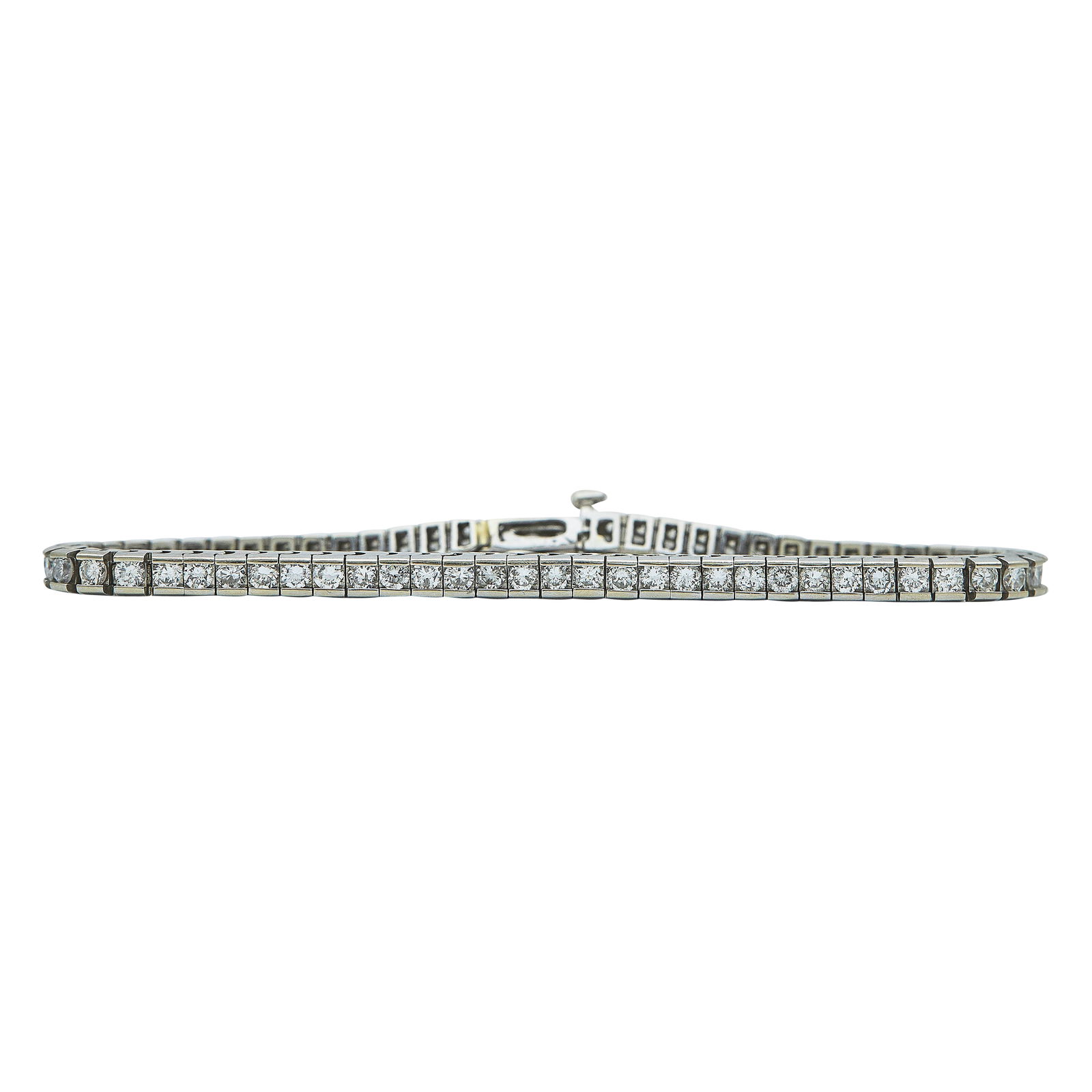 14K White Gold 3.30 Carat Atw Diamond Tennis Bracelet: METAL: 14K White Gold; APPROXIMATE TOTAL DIAMOND WEIGHT: 3.30 ctw; APPROXIMATE DIAMOND COLOR(S): Near Colorless; APPROXIMATE DIAMOND CLARITY: I1-I2; STAMPED: 14K; CONDITION: Pre-owned, Very Good; ITEM