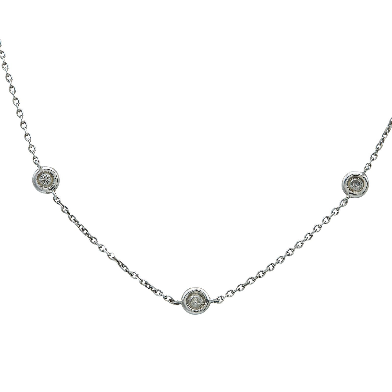 14K White Gold 0.35 Carat Atw. Diamond Station Necklace: METAL: 14K White Gold; APPROXIMATE TOTAL DIAMOND WEIGHT: 0.35 ctw; STAMPED: 14K, Pictoral mark; CONDITION: Pre-owned, Very Good; ITEM WEIGHT (GRAMS): 2.14 g; MEASUREMENTS: Necklace 18 inches long