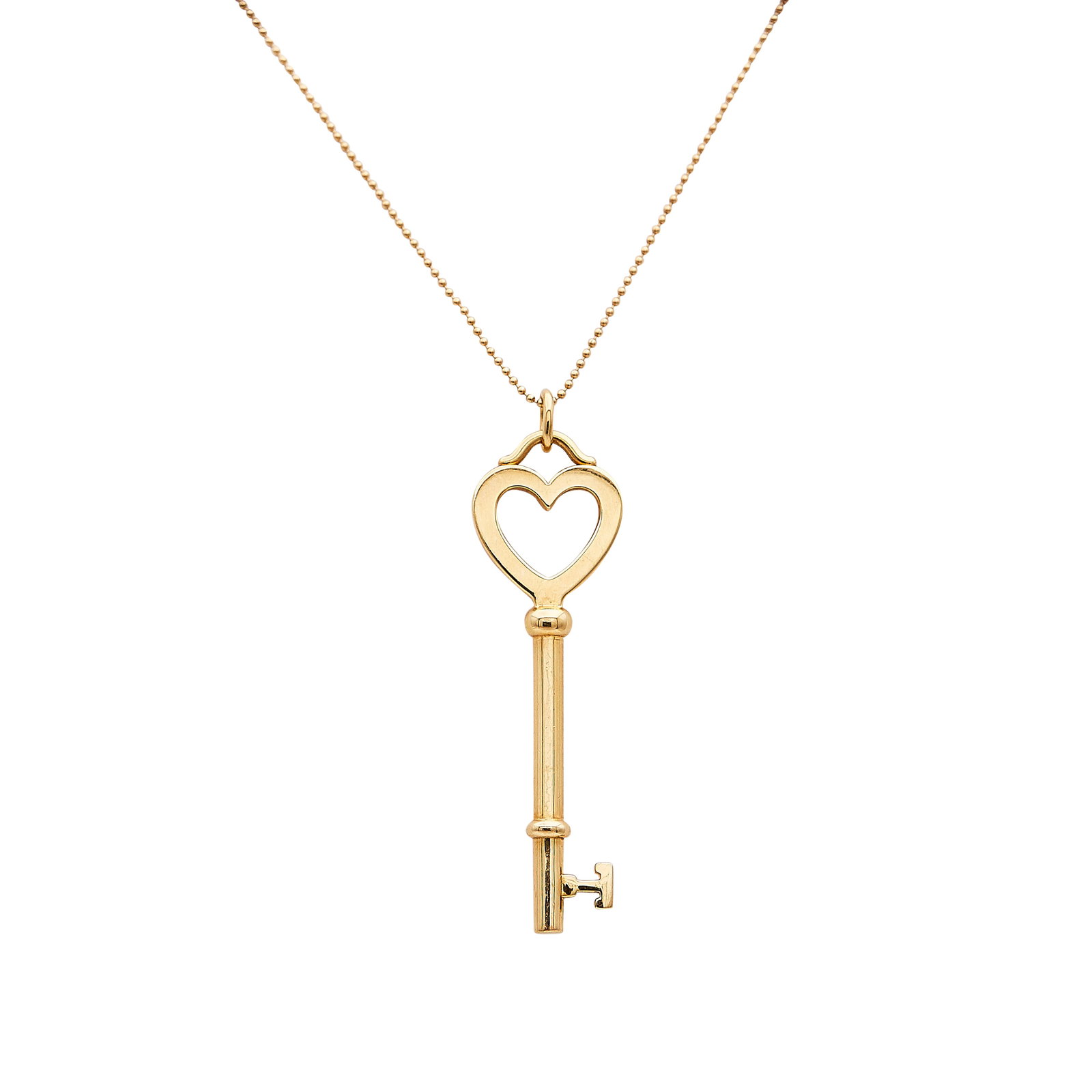 Tiffany & Co. Tiffany Keys 18K Yellow Gold Pendant Necklace: BRAND: Tiffany & Co.; COLLECTION: Tiffany Keys; METAL: 18K Yellow Gold; STAMPED: Pendant marked: © Tiffany & Co, Au750; Chain marked: © Tiffany & Co, Au750; CONDITION: Pre-owned, Very Good; ITEM WEI