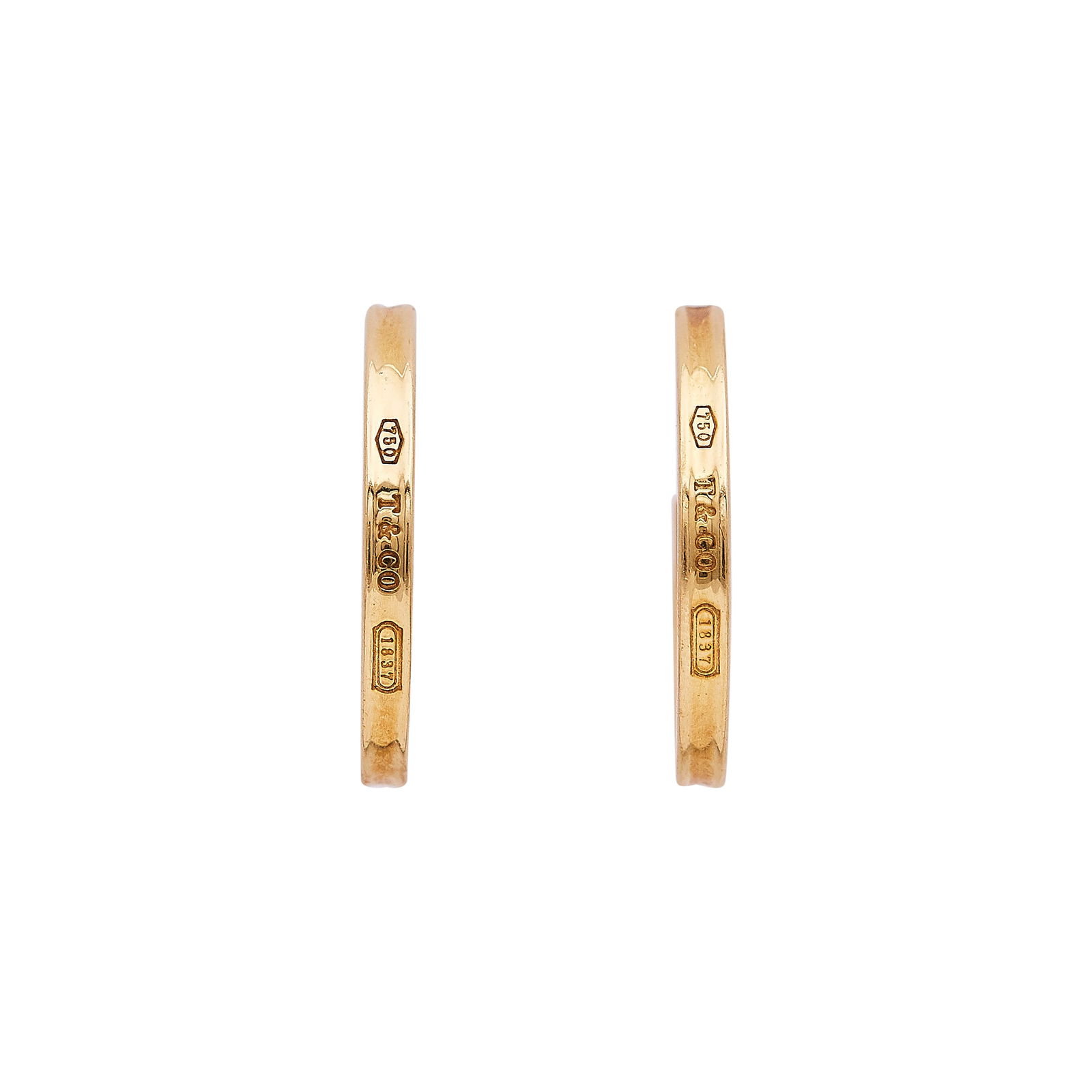 Tiffany & Co. Tiffany 1837 18K Yellow Gold Hoop Earrings: BRAND: Tiffany & Co.; COLLECTION: Tiffany 1837; METAL: 18K Yellow Gold; STAMPED: 750, T & CO, 1837; CONDITION: Pre-owned, Very Good; ITEM WEIGHT (GRAMS): 9.13 g; MEASUREMENTS: Earrings 1 1/16 inch in