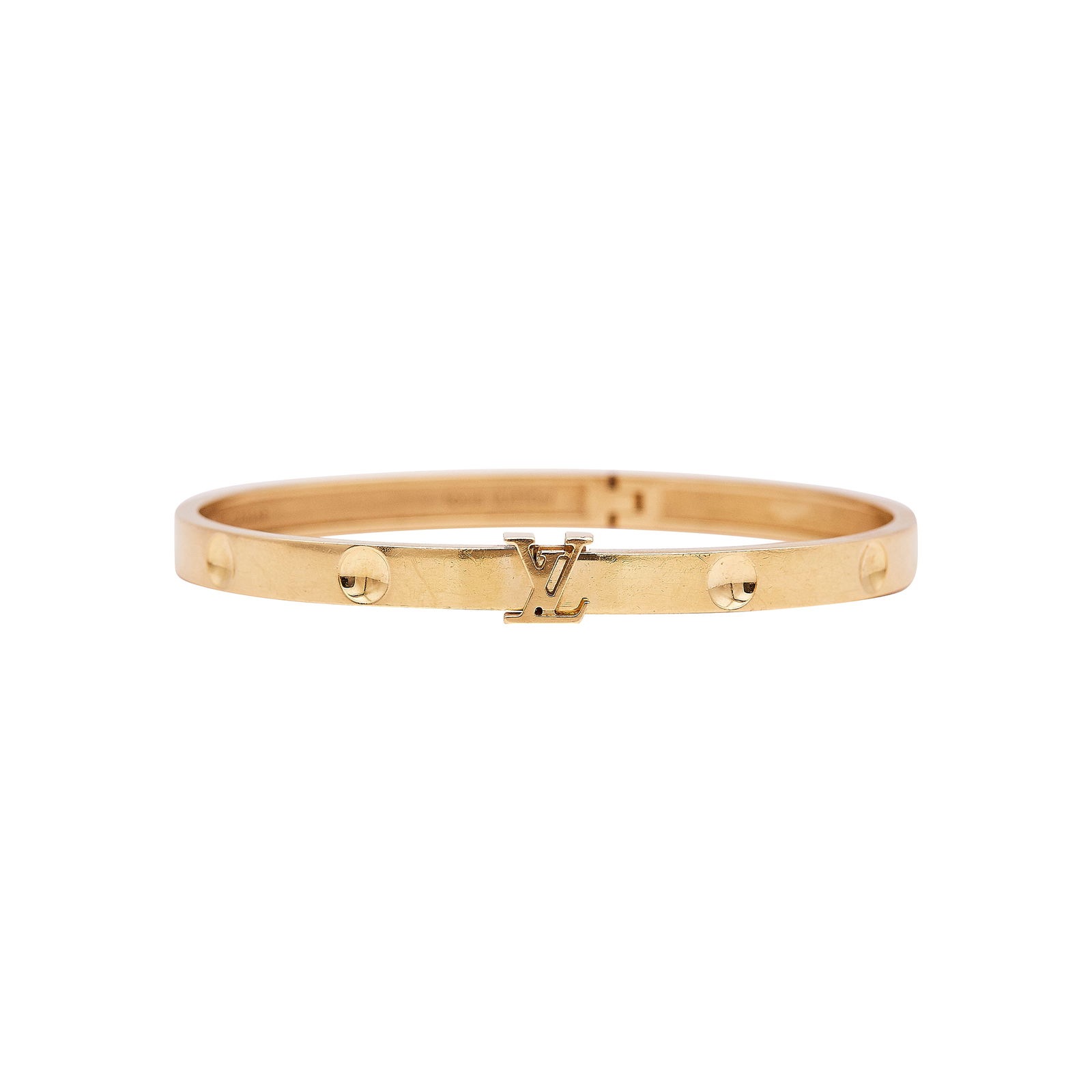 Louis Vuitton Empreinte 18K Yellow Gold Hinged Bangle Bracelet: BRAND: Louis Vuitton; METAL: 18K Yellow Gold; STAMPED: MADE IN FRANCE Au 750, workshop mark, 17, numbered, LOUIS VUITTON; CONDITION: Pre-owned, Good; ITEM WEIGHT (GRAMS): 22 g; MEASUREMENTS: LV size 1