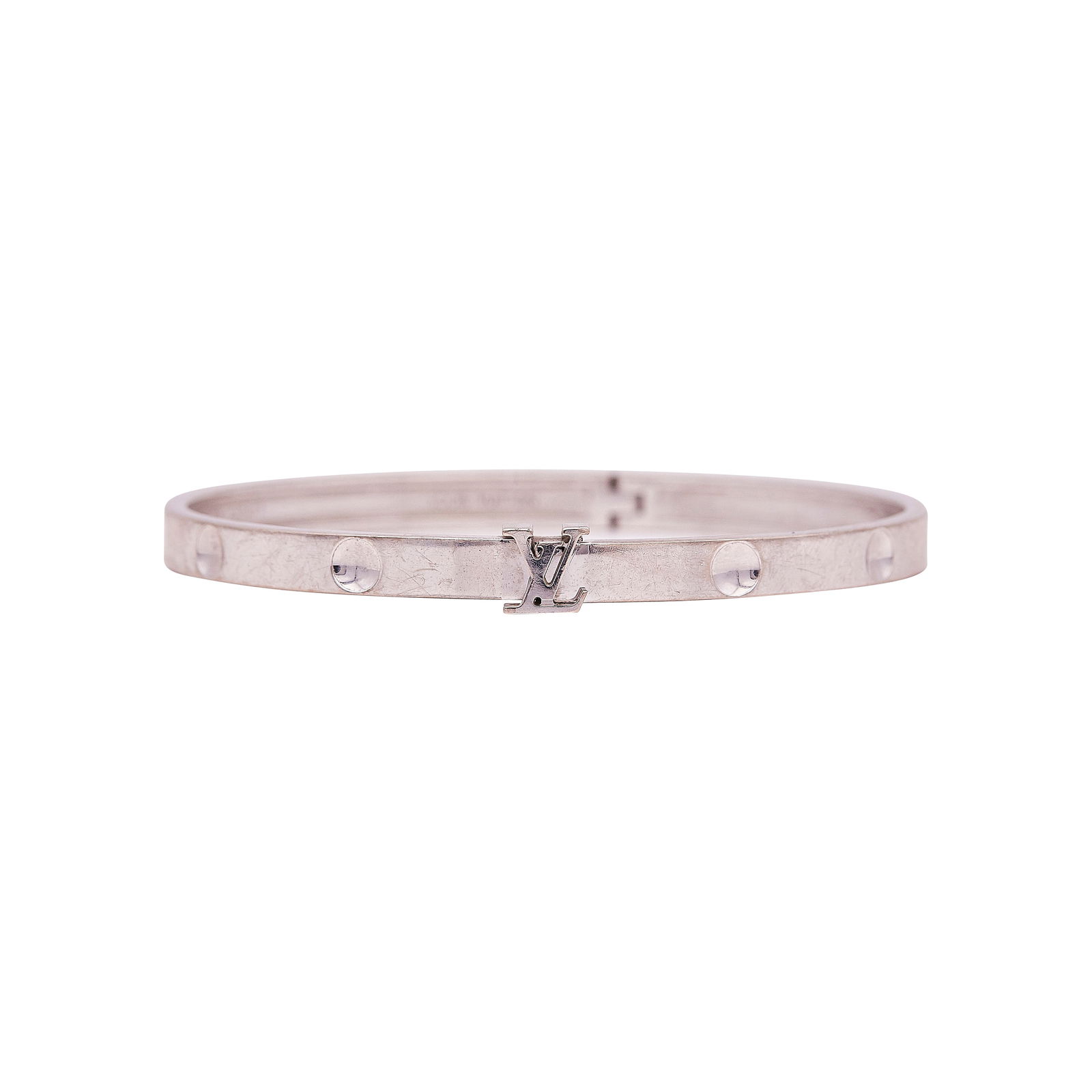 Louis Vuitton Empreinte 18K White Gold Hinged Bangle Bracelet: BRAND: Louis Vuitton; METAL: 18K White Gold; STAMPED: MADE IN FRANCE Au 750, workshop mark, 18, numbered, LOUIS VUITTON; CONDITION: Pre-owned, Good; ITEM WEIGHT (GRAMS): 22 g; MEASUREMENTS: LV size 18