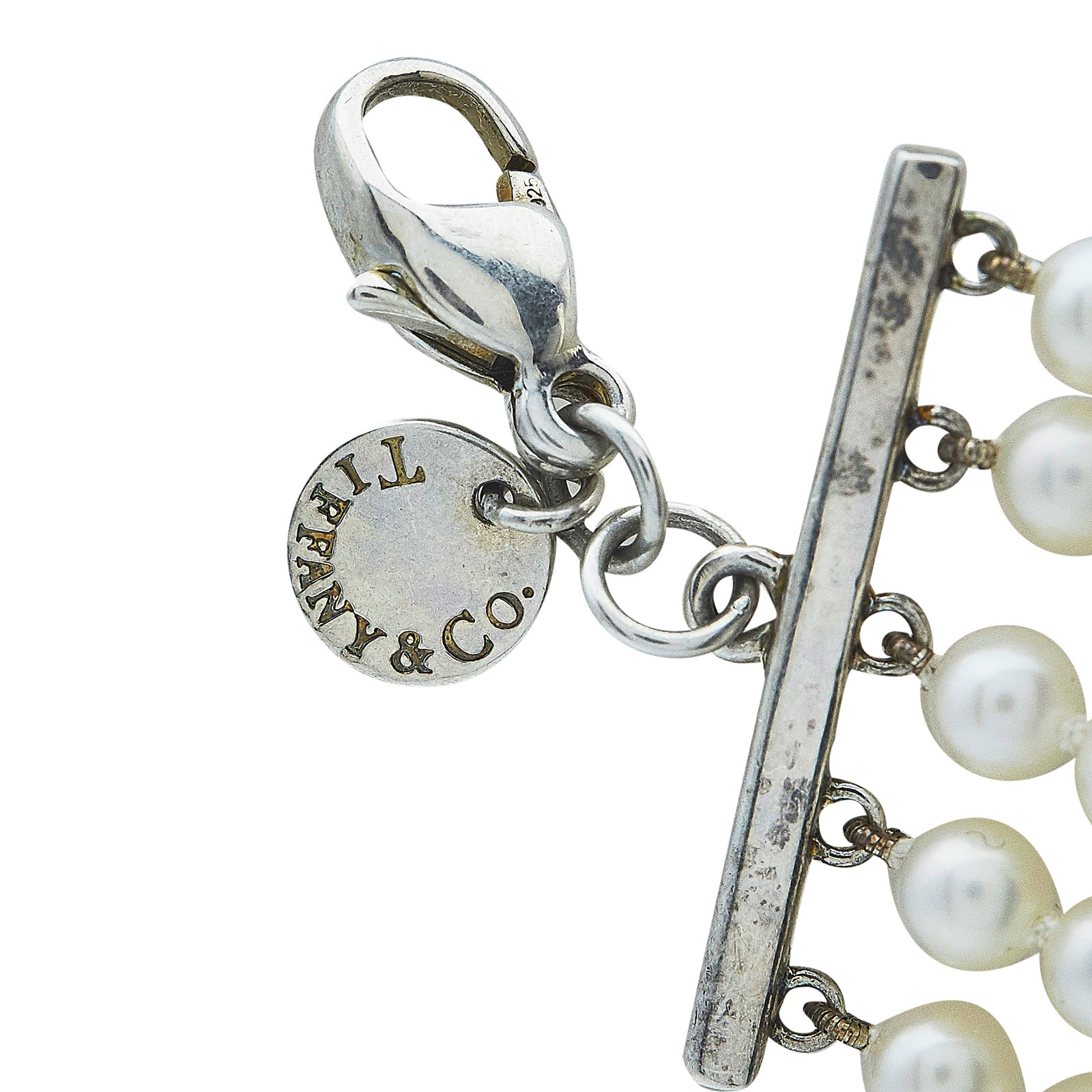 Tiffany & Co. Sterling Silver and Akoya Pearl Five Row Bracelet: BRAND: Tiffany & Co.; METAL: Silver; GEMSTONES: Akoya pearls approx. 4.50mm in diameter; STAMPED: © T & Co., 925; CONDITION: Pre-owned, Very Good; ITEM WEIGHT (GRAMS): 25.13 g; MEASUREMENTS: Bracelet