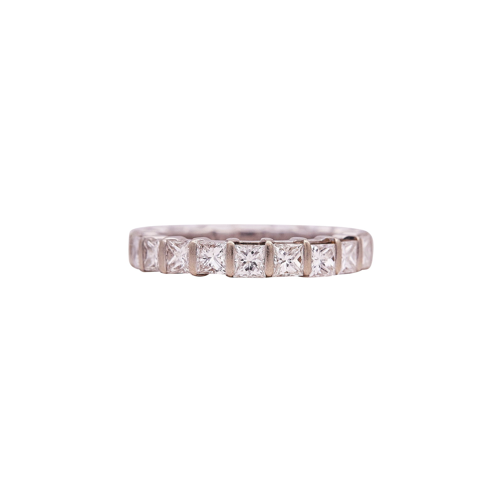 18K White Gold and Princess Cut Diamond Band Ring: METAL: 18K White Gold; APPROXIMATE TOTAL DIAMOND WEIGHT: 2.52 ctw; STAMPED: 18K EWB; CONDITION: Pre-owned, Good; ITEM WEIGHT (GRAMS): 4.95 g; MEASUREMENTS: Ring size 6; ADDITIONAL COMMENTS: Some diamo