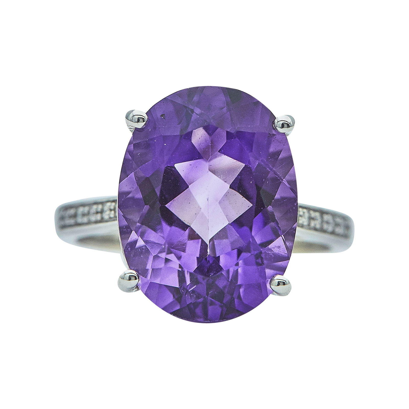 14K White Gold Oval Cut Amethyst and Diamond Ring: METAL: 14K White Gold; APPROXIMATE TOTAL DIAMOND WEIGHT: 0.05 ctw; GEMSTONES: Amethyst approx. 9.11 carats weight estimated by formula; STAMPED: Tremonti AM 9.11 D0.05 14K; CONDITION: Pre-owned, Very