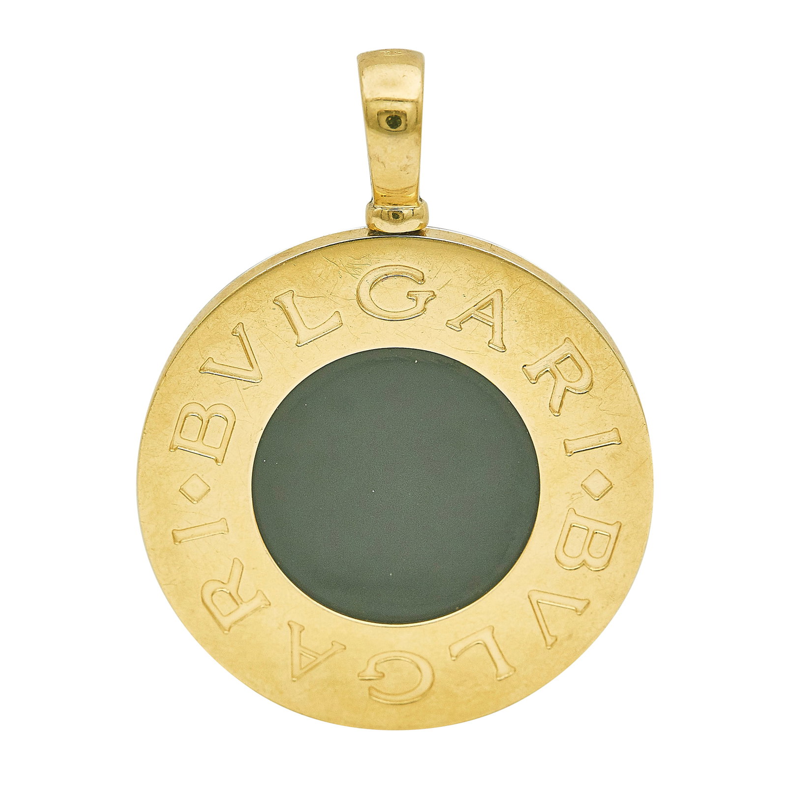 Bulgari Bvlgari 18K Yellow Gold and Stainless Steel Onyx Pendant: BRAND: Bulgari; COLLECTION: Bulgari-Bulgari; METAL: 18K Yellow Gold/Stainless Steel; STAMPED: STEEL AND GOLD, 750, Italian workshop mark, BVLGARI; CONDITION: Pre-owned, Very Good; ITEM WEIGHT (GRAMS):