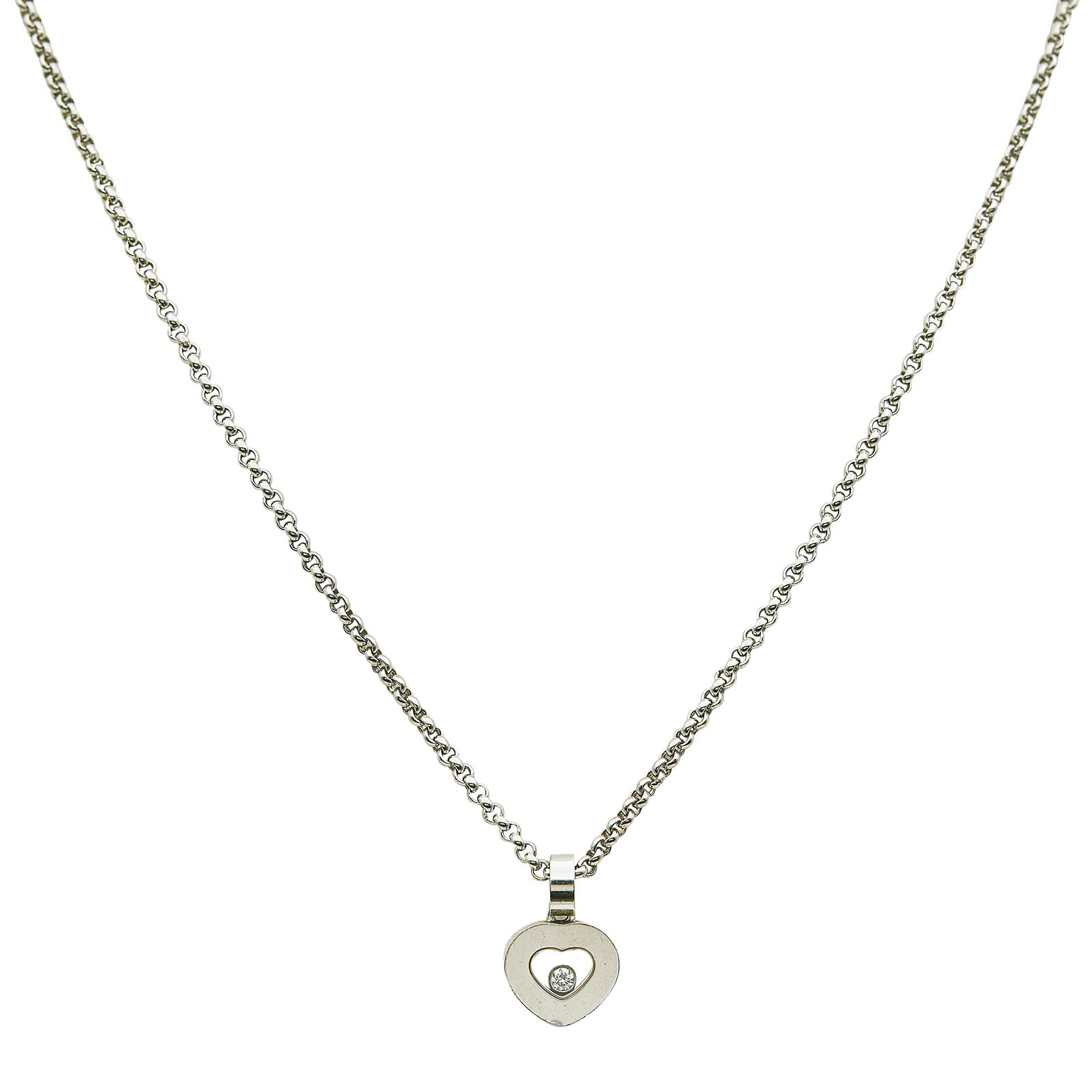 Chopard Happy Diamonds Icons 18K White Gold Heart Pendant Necklace: BRAND: Chopard; COLLECTION: Happy Diamonds; METAL: 18K White Gold; APPROXIMATE TOTAL DIAMOND WEIGHT: 0.05 ctw; GEMSTONES: Rock crystal; STAMPED: Chopard, 750, numbered, assay marks, workshop marks; CO