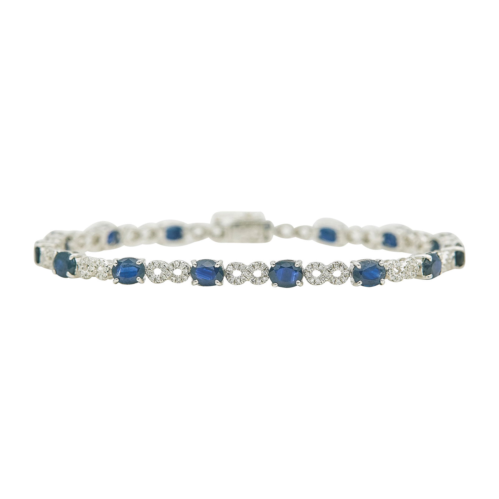 EFFY 14K White Gold Sapphire and Diamond Tennis Bracelet: METAL: 14K White Gold; APPROXIMATE TOTAL DIAMOND WEIGHT: 1.50 ctw; GEMSTONES: Sapphires approx. 3.60 carats, weight estimated by formula; STAMPED: Bracelet stamped: 14K EFFY; CONDITION: Pre-owned, Ver