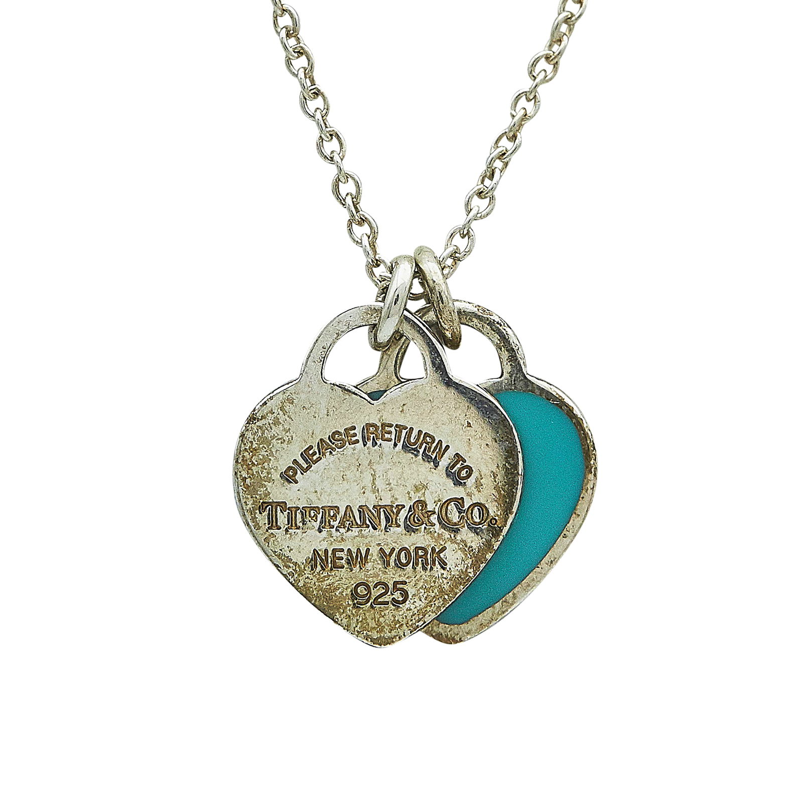 Tiffany & Co. Return to Tiffany Sterling Silver Enamel Double Heart Tag Pendant Necklace: BRAND: Tiffany & Co.; COLLECTION: Return To Tiffany; METAL: Silver; STAMPED: Chain stamped ©TIFFANY & CO., 925; Pendant stamped Please Return to Tiffany & Co. New York, 925; CONDITION: Pre-owned, Ver