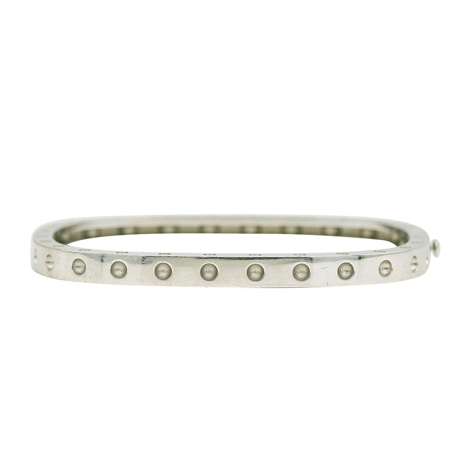 Roberto Coin 18K White Gold Bangle Bracelet: BRAND: Roberto Coin; METAL: 18K White Gold; GEMSTONES: Synthetic Ruby; STAMPED: RC, 18KT; CONDITION: Pre-owned, Good; ITEM WEIGHT (GRAMS): 18.4 g; MEASUREMENTS: Bracelets interior width is 2 1/8
