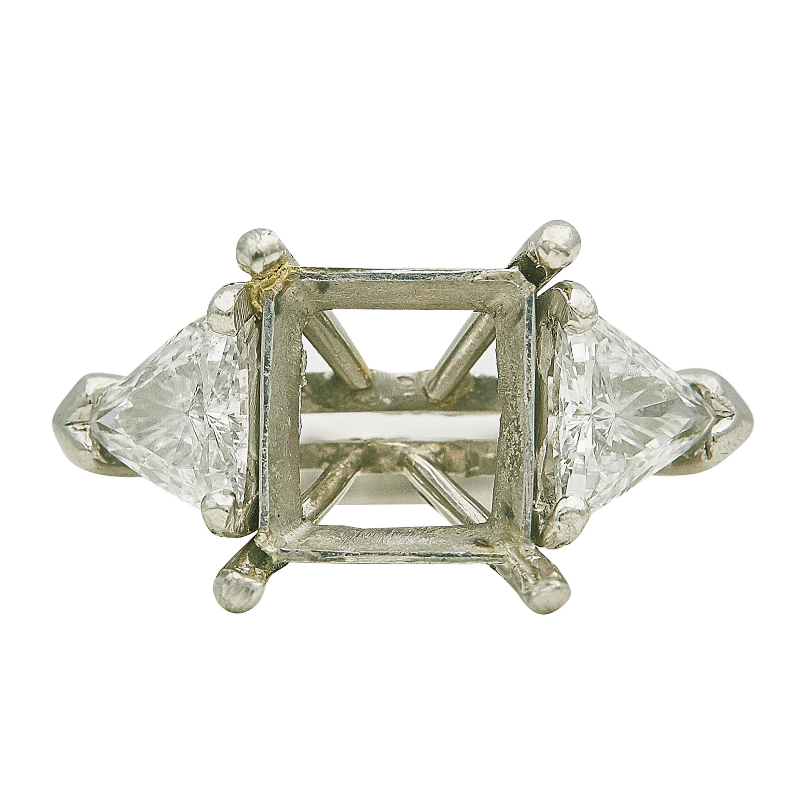 Platinum and Trillion Cut Diamond Setting: METAL: Platinum; SHAPE: Trilliant; APPROXIMATE TOTAL DIAMOND WEIGHT: 0.98 ctw; STAMPED: PLAT, rubbed marks; CONDITION: Pre-owned, Good; ITEM WEIGHT (GRAMS): 7.4 g; MEASUREMENTS: Ring size 4, Center wi