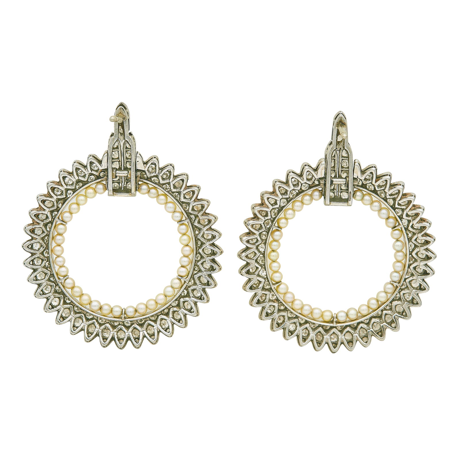 Platinum Pearl Diamond Brooch & Earring Lot: METAL: Platinum; APPROXIMATE TOTAL DIAMOND WEIGHT: 9.90 ctw; GEMSTONES: Pearls; TESTED: Platinum; CONDITION: Pre-owned, Good; ITEM WEIGHT (GRAMS): 49.7 g; MEASUREMENTS: Brooch is 2.5 inches wide, Earr