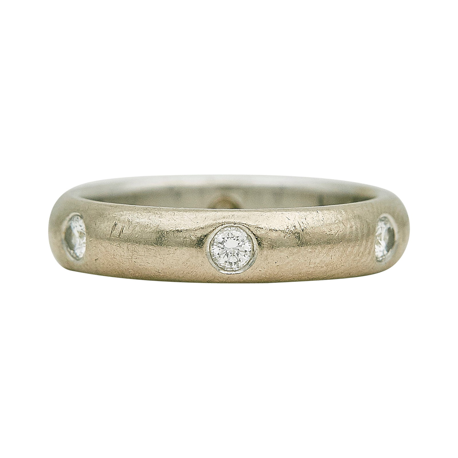 Cartier 18K White Gold and Diamond Band Ring: BRAND: Cartier; METAL: 18K White Gold; APPROXIMATE TOTAL DIAMOND WEIGHT: 0.36 ctw; STAMPED: 750 Cartier, ©1992, serial number, French Mark; CONDITION: Pre-owned, Good; ITEM WEIGHT (GRAMS): 4.6 g; MEA