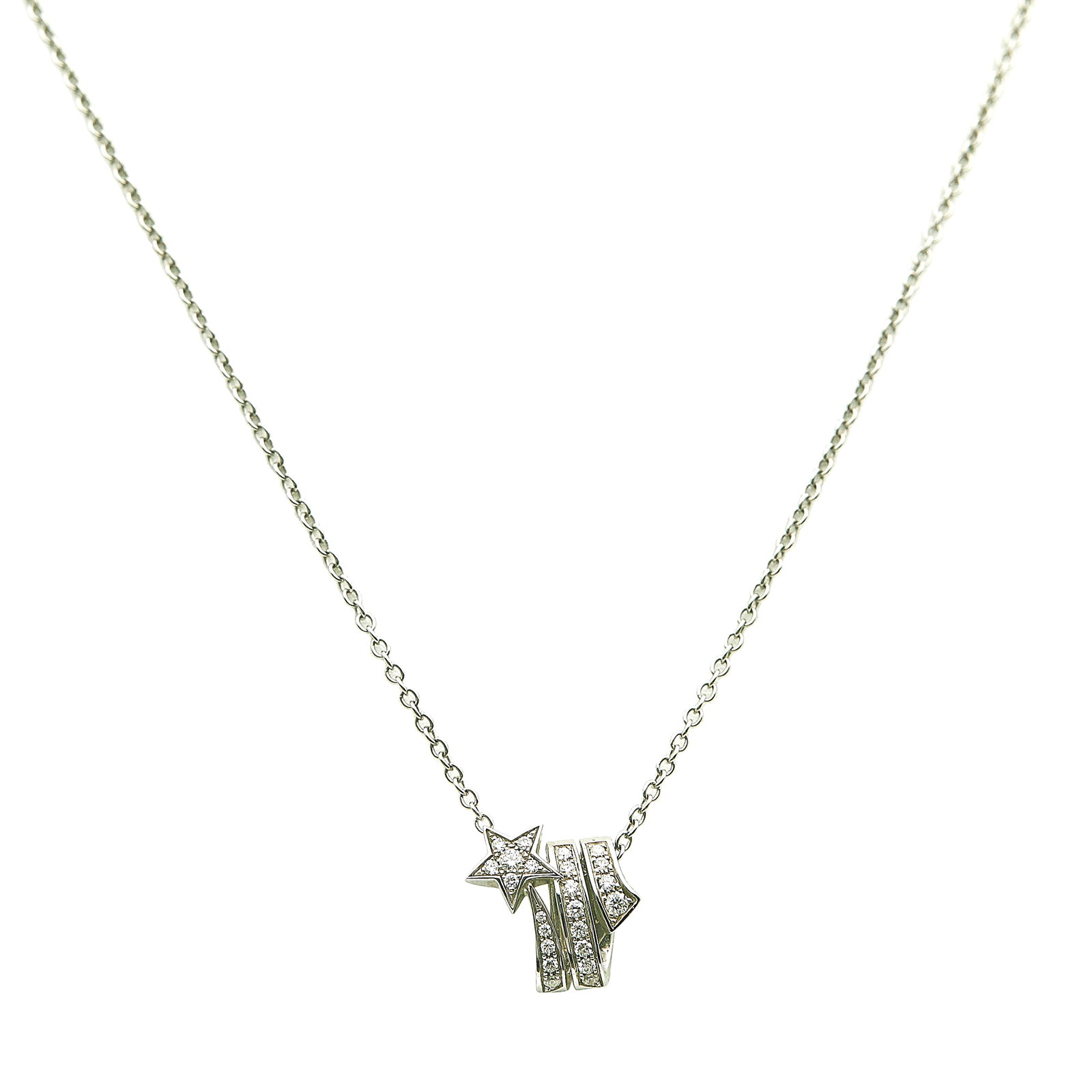 Chanel Étoile Filante 18K White Gold and Diamond Pendant Necklace: BRAND: Chanel; METAL: 18K White Gold; APPROXIMATE TOTAL DIAMOND WEIGHT: 0.24 ctw; STAMPED: Pendant Marked: © Chanel, Au750, Serial number, Italian workshop mark; Clasp marked: 750; CONDITION: Pre-own