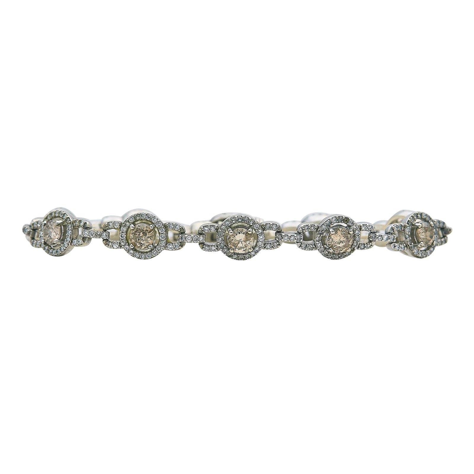 14K White Gold Diamond and Brown Diamond Link Bracelet: METAL: 14K White Gold; APPROXIMATE TOTAL DIAMOND WEIGHT: 1.40 ctw; GEMSTONES: Brown diamonds approx. total weight 4.40 carats; STAMPED: 14K, Maker's Mark; CONDITION: Pre-owned, Good; ITEM WEIGHT (GRAM