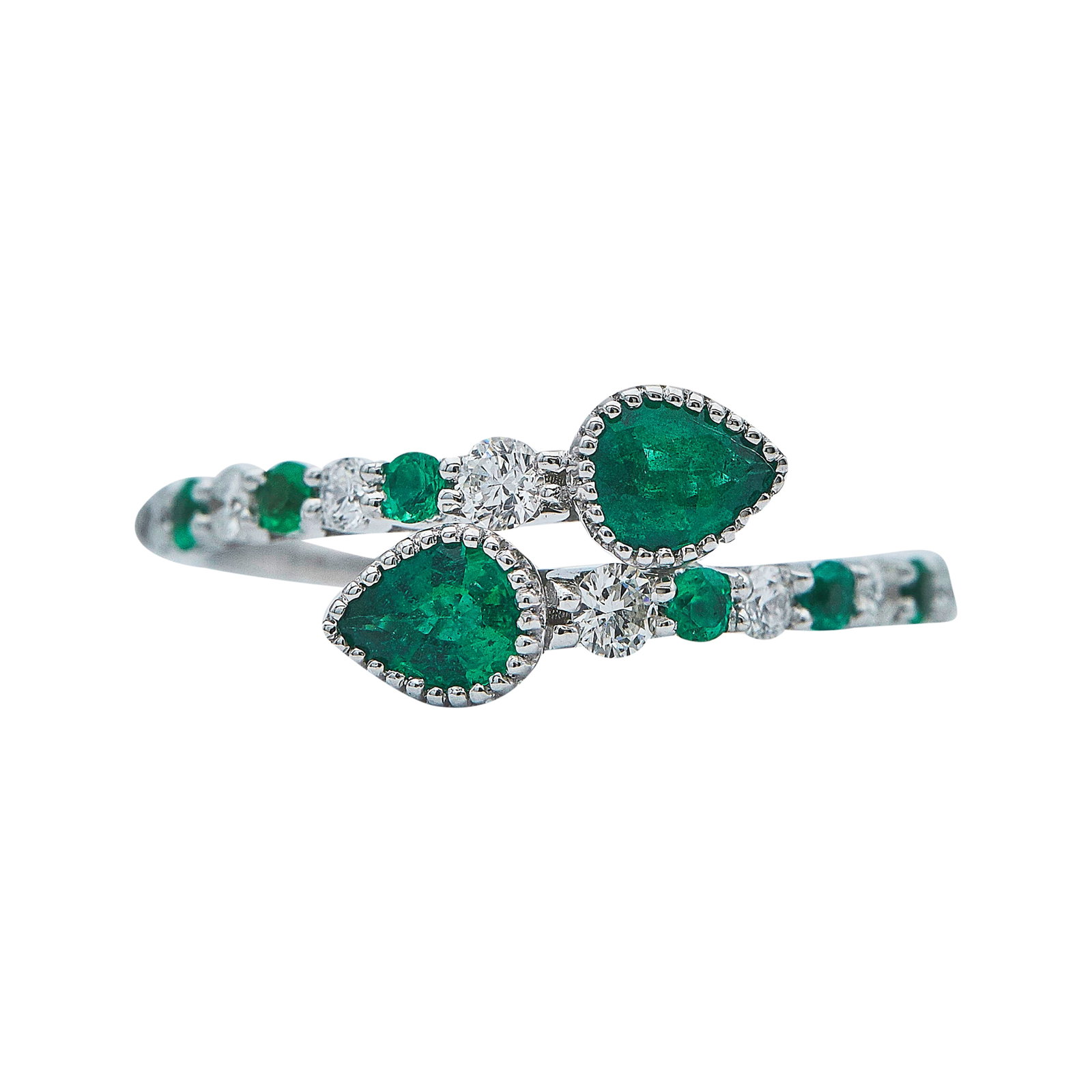 18K White Gold Emerald and Diamond Toi et Moi Ring: METAL: 18K White Gold; APPROXIMATE TOTAL DIAMOND WEIGHT: 0.28 ctw; GEMSTONES: Emerald; STAMPED: E-0.66ct, D-0.28ct, 750; CONDITION: Pre-owned, Very Good; ITEM WEIGHT (GRAMS): 2.8 g; MEASUREMENTS: Ring